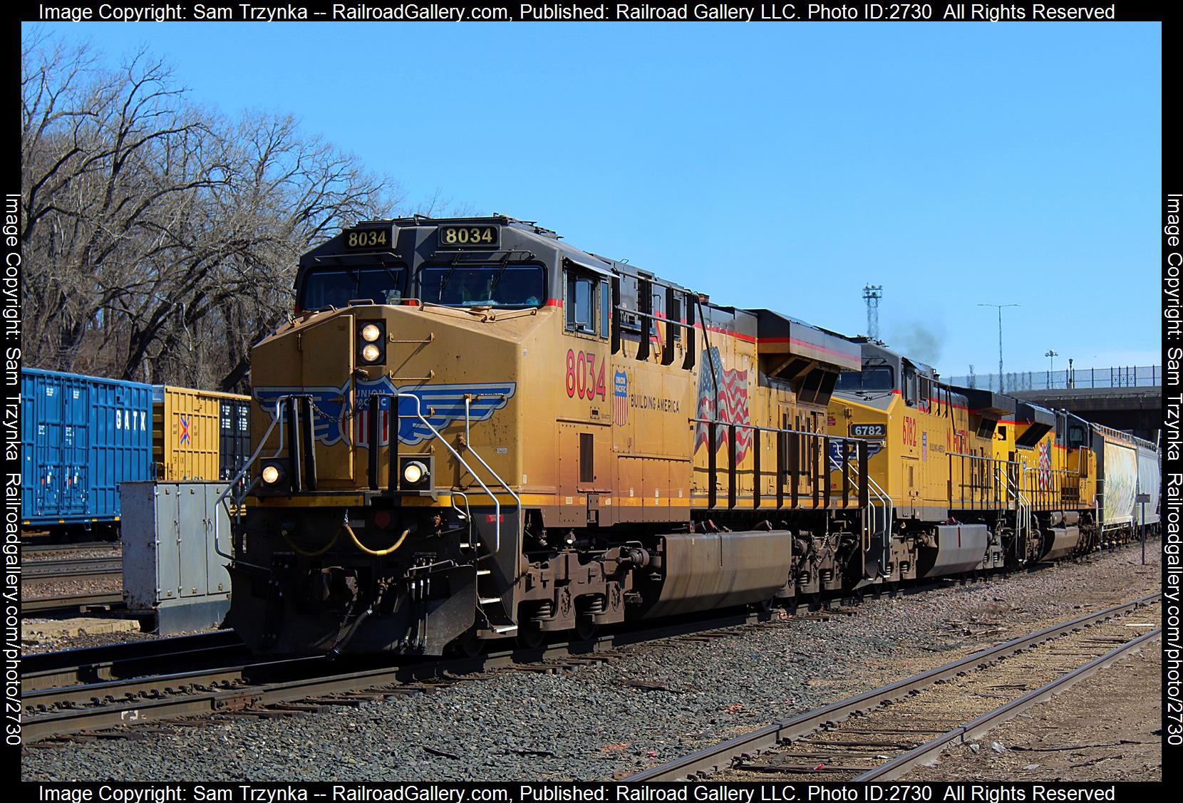 UP 8034 is a class GE ES44AC and  is pictured in St. Paul, Minnesota, USA.  This was taken along the BNSF St. Paul Subdivision on the Union Pacific Railroad. Photo Copyright: Sam Trzynka uploaded to Railroad Gallery on 12/19/2023. This photograph of UP 8034 was taken on Friday, March 24, 2023. All Rights Reserved. 