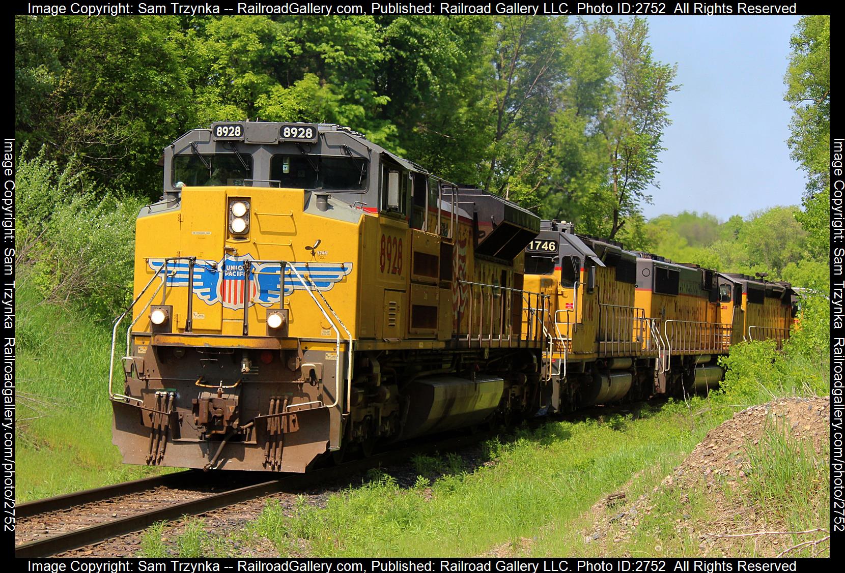 UP 8928 is a class EMD SD70AH and  is pictured in Inver Grove Heights, Minnesota, USA.  This was taken along the UP Albert Lea Subdivision on the Union Pacific Railroad. Photo Copyright: Sam Trzynka uploaded to Railroad Gallery on 12/21/2023. This photograph of UP 8928 was taken on Sunday, May 21, 2023. All Rights Reserved. 