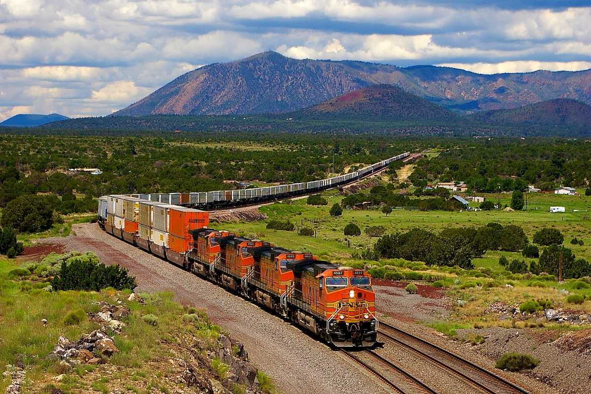 BNSF 4597 is a class GE C44-9W (Dash 9-44CW) and  is pictured in Flagstaff, Arizona, USA.  This was taken along the Seligman/BNSF on the BNSF Railway. Photo Copyright: Rick Doughty uploaded to Railroad Gallery on 12/23/2023. This photograph of BNSF 4597 was taken on Saturday, July 26, 2008. All Rights Reserved. 