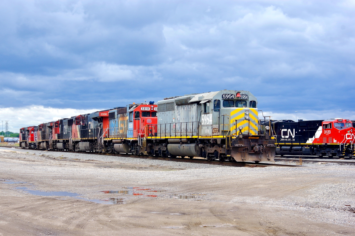 GTW 5954 is a class EMD SD40-2 and  is pictured in Memphis, Tennessee, USA.  This was taken along the Memphis/CN on the Grand Trunk. Photo Copyright: Rick Doughty uploaded to Railroad Gallery on 12/25/2023. This photograph of GTW 5954 was taken on Saturday, April 25, 2020. All Rights Reserved. 