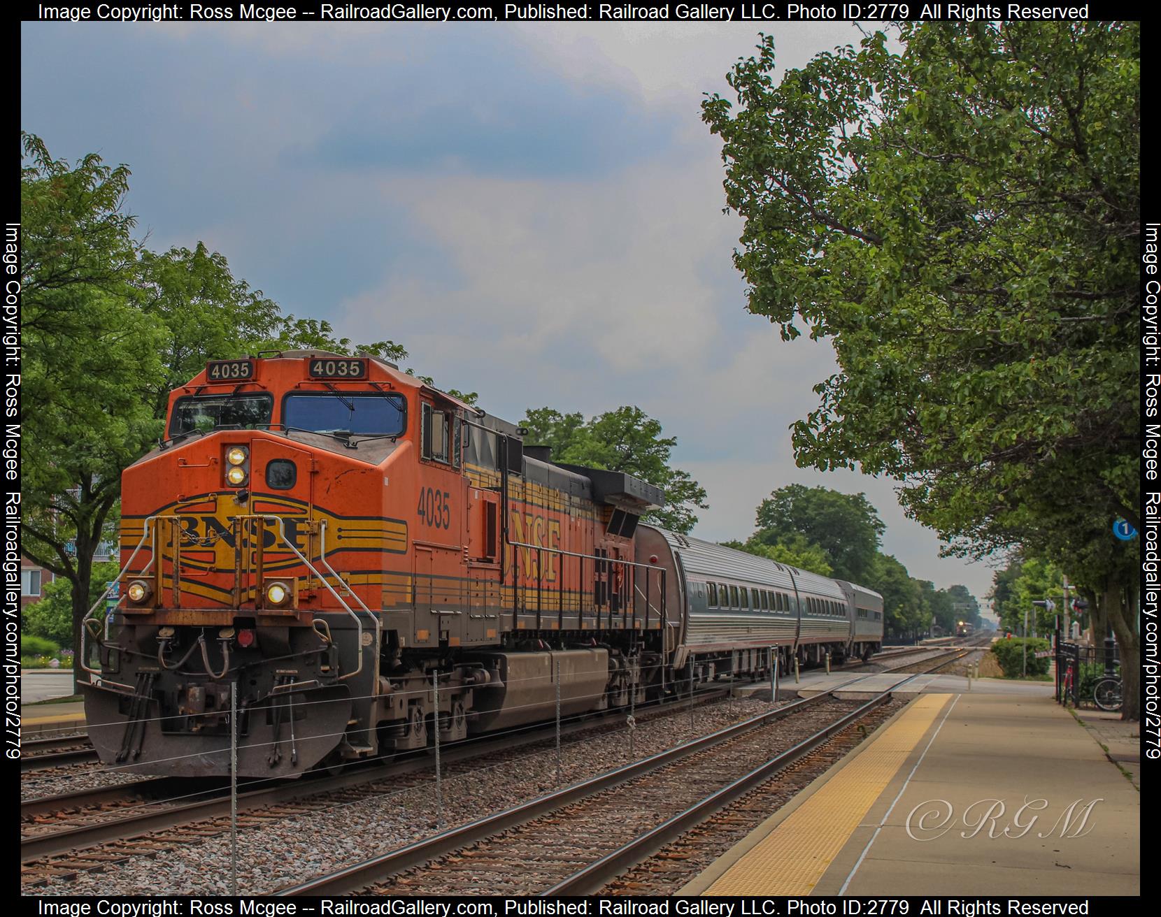 BNSF #4035 is a class C44-9W and  is pictured in La Grange, Illinois, USA.  This was taken along the BNSF Racetrack on the BNSF Railway. Photo Copyright: Ross Mcgee uploaded to Railroad Gallery on 12/25/2023. This photograph of BNSF #4035 was taken on Thursday, July 07, 2022. All Rights Reserved. 