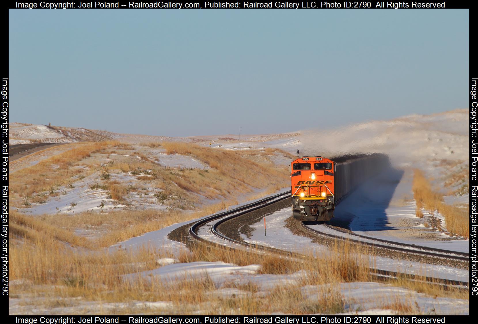 BNSF 8564 is a class EMD SD70ACe and  is pictured in Bingham, Nebraska, USA.  This was taken along the Sand Hills Sub on the BNSF Railway. Photo Copyright: Joel Poland uploaded to Railroad Gallery on 12/26/2023. This photograph of BNSF 8564 was taken on Saturday, February 25, 2023. All Rights Reserved. 