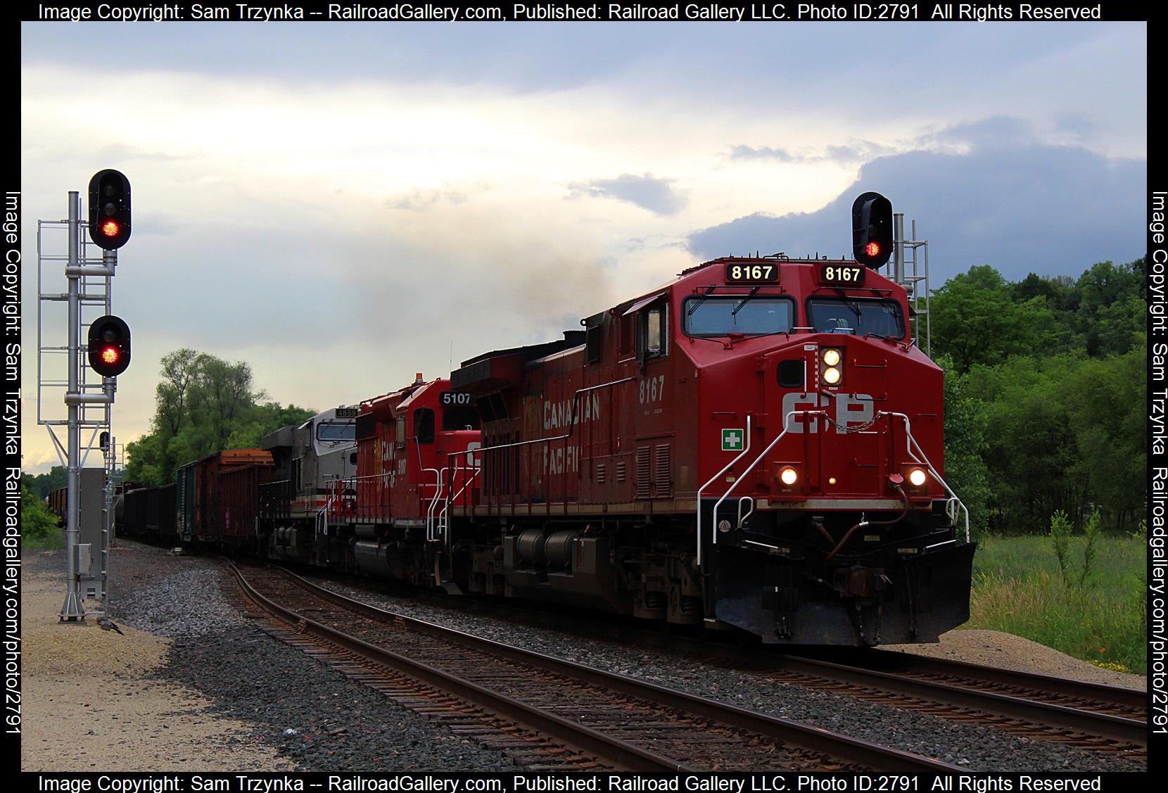 CP 8167 is a class GE AC4400CWM and  is pictured in Cottage Grove, Minnesota, USA.  This was taken along the CP River Subdivision on the Canadian Pacific Railway. Photo Copyright: Sam Trzynka uploaded to Railroad Gallery on 12/26/2023. This photograph of CP 8167 was taken on Saturday, June 24, 2023. All Rights Reserved. 