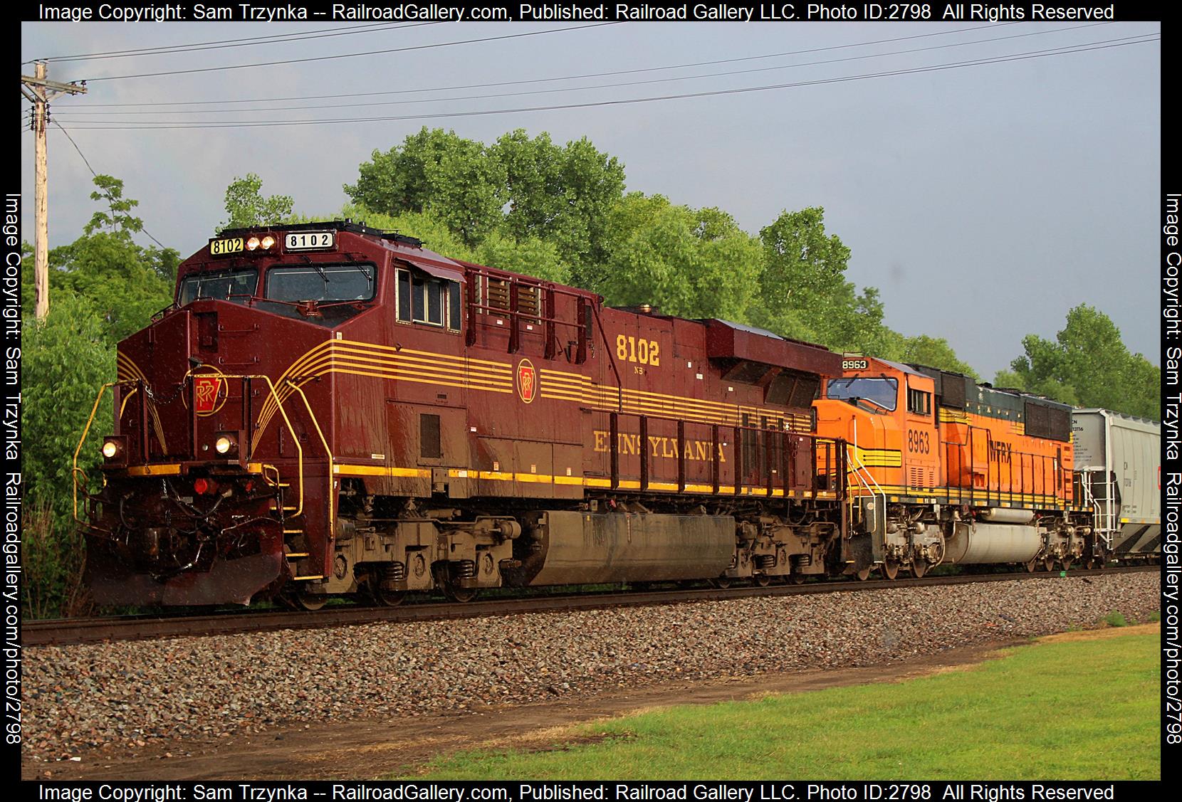 NS 8102 is a class GE ES44AC and  is pictured in St. Paul Park, Minnesota, USA.  This was taken along the BNSF St. Paul Subdivision on the BNSF Railway. Photo Copyright: Sam Trzynka uploaded to Railroad Gallery on 12/27/2023. This photograph of NS 8102 was taken on Saturday, June 24, 2023. All Rights Reserved. 