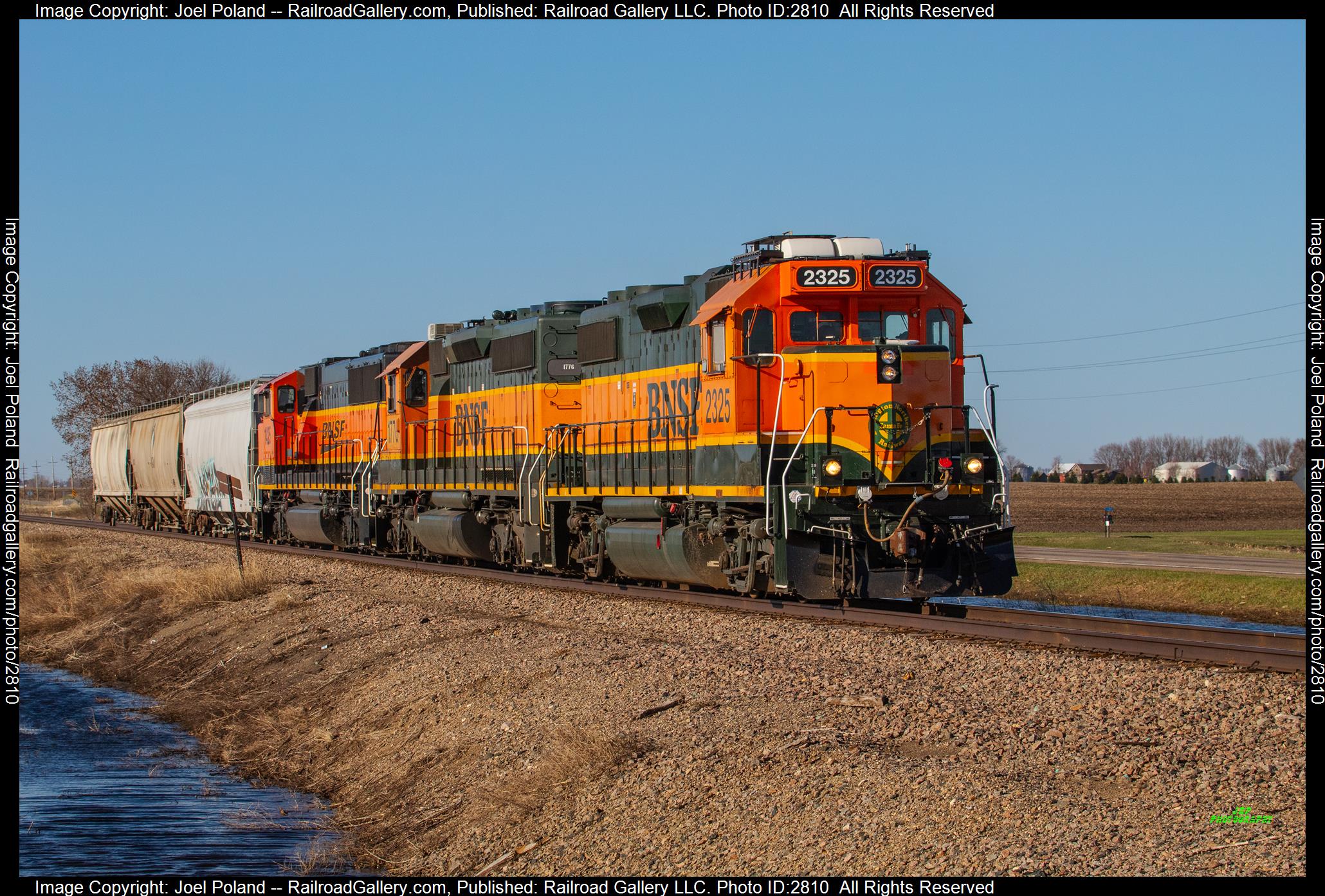 BNSF 2325 is a class EMD GP38-2 and  is pictured in Cottonwood, Minnesota, USA.  This was taken along the Marshall Sub on the BNSF Railway. Photo Copyright: Joel Poland uploaded to Railroad Gallery on 12/28/2023. This photograph of BNSF 2325 was taken on Monday, May 01, 2023. All Rights Reserved. 