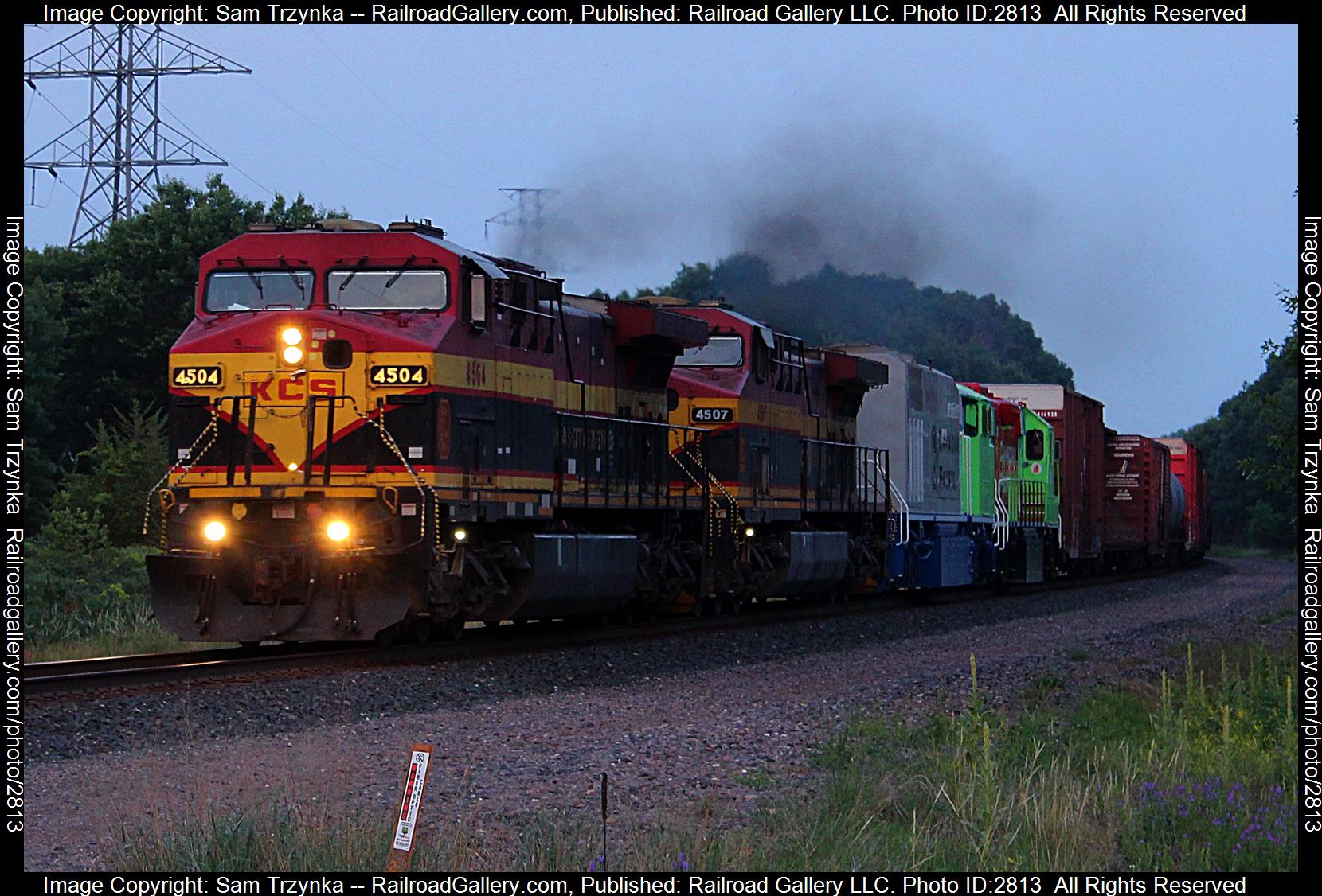 KCSM 4504 is a class GE AC4400CW and  is pictured in Red Wing, Minnesota, USA.  This was taken along the CP River Subdivision on the CPKC Railway. Photo Copyright: Sam Trzynka uploaded to Railroad Gallery on 12/28/2023. This photograph of KCSM 4504 was taken on Saturday, July 01, 2023. All Rights Reserved. 