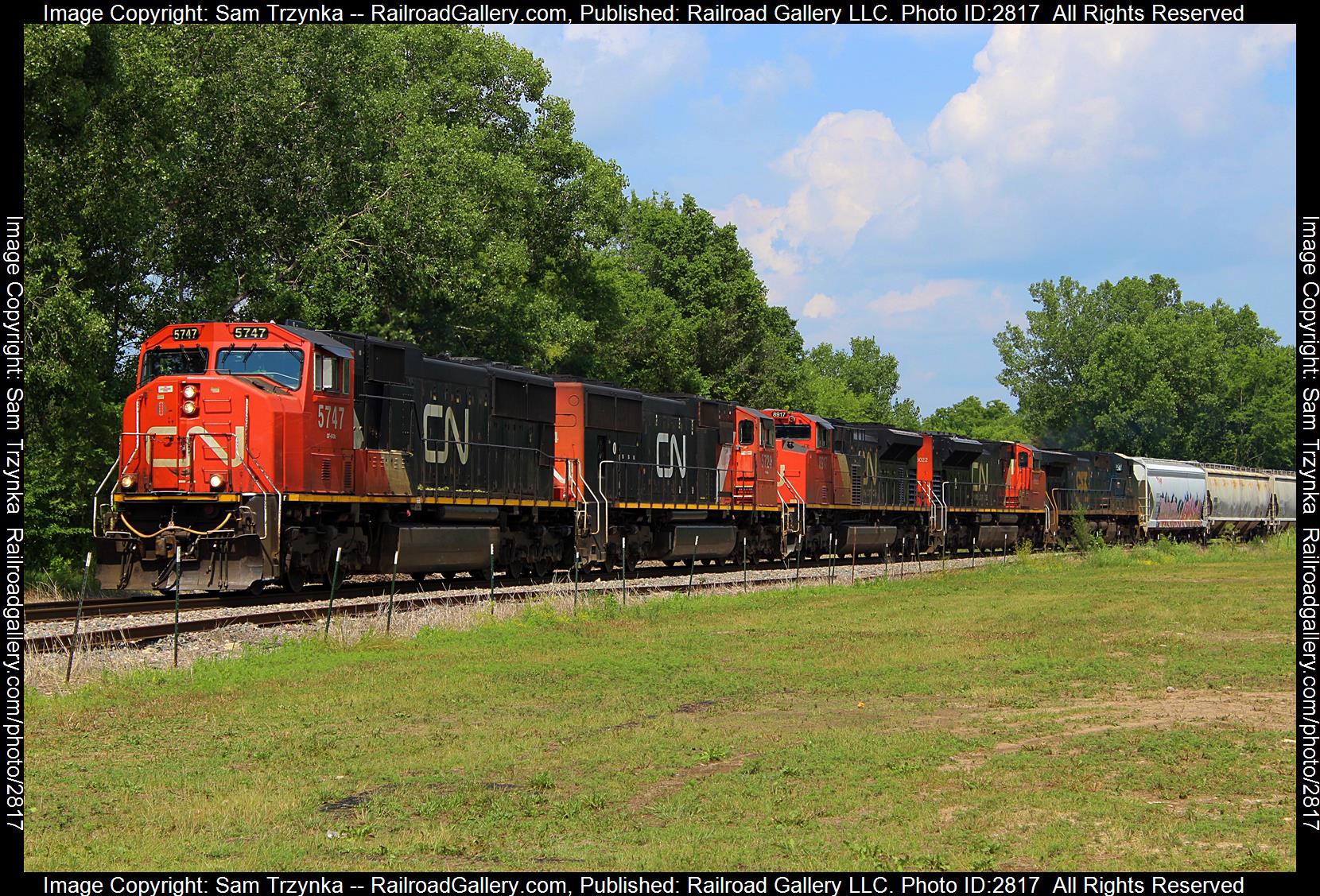 CN 5747 is a class EMD SD75I and  is pictured in Cedar Falls, Iowa, USA.  This was taken along the CN Waterloo Subdivision on the Canadian National Railway. Photo Copyright: Sam Trzynka uploaded to Railroad Gallery on 12/29/2023. This photograph of CN 5747 was taken on Sunday, July 02, 2023. All Rights Reserved. 