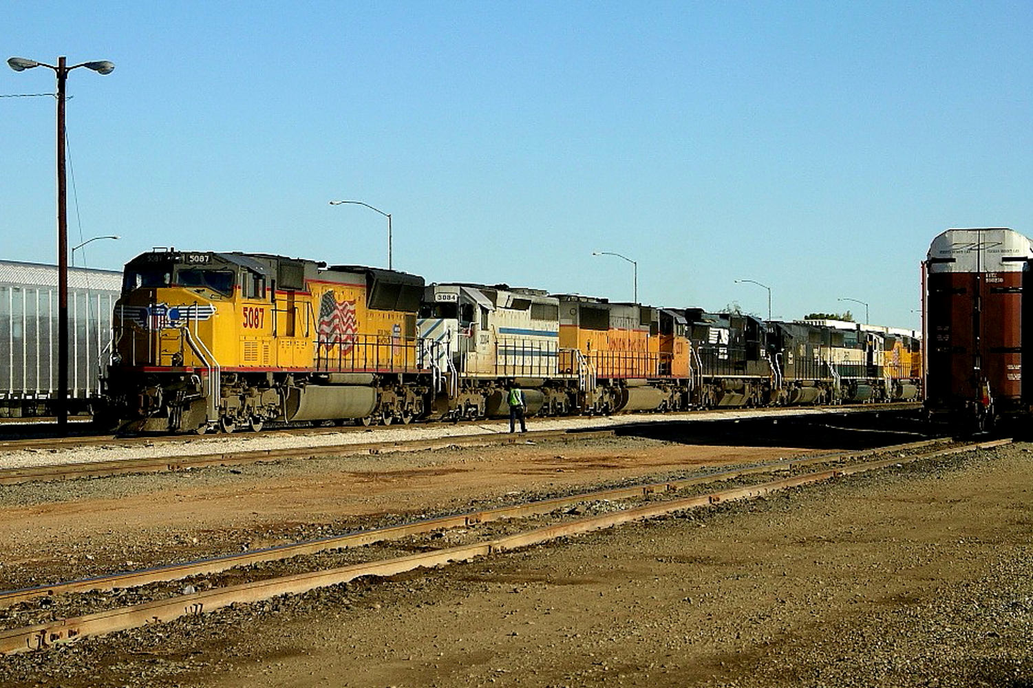 UP 5087 is a class EMD SD70 and  is pictured in Tucson, Arizona, USA.  This was taken along the Lordsburg/UP on the Union Pacific Railroad. Photo Copyright: Rick Doughty uploaded to Railroad Gallery on 12/30/2023. This photograph of UP 5087 was taken on Friday, November 26, 2004. All Rights Reserved. 