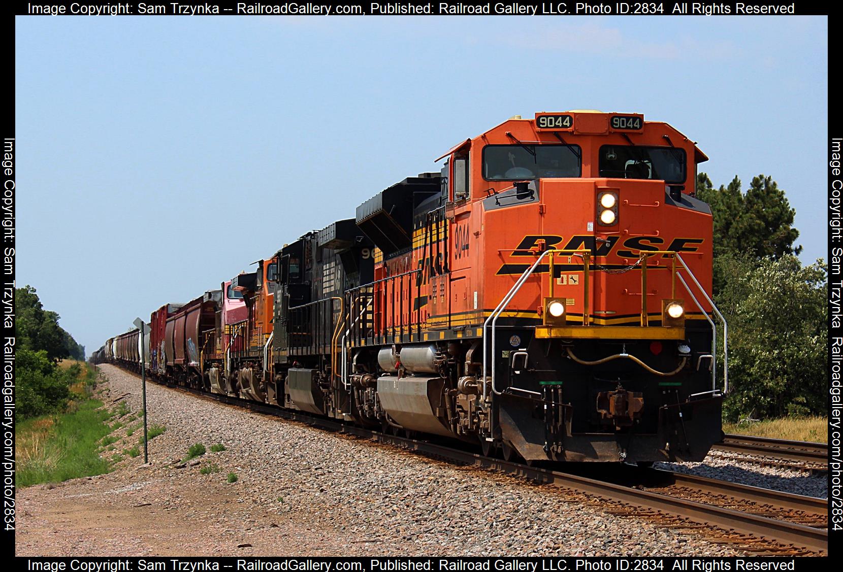 BNSF 9044 is a class EMD SD70ACe and  is pictured in Becker, Minnesota, USA.  This was taken along the BNSF Staples Subdivision on the BNSF Railway. Photo Copyright: Sam Trzynka uploaded to Railroad Gallery on 12/31/2023. This photograph of BNSF 9044 was taken on Sunday, July 09, 2023. All Rights Reserved. 