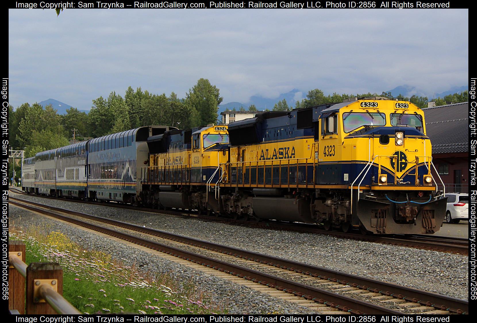 ARR 4323 is a class EMD SD70MAC and  is pictured in Anchorage, Alaska, USA.  This was taken along the ARR Mainline on the Alaska Railroad. Photo Copyright: Sam Trzynka uploaded to Railroad Gallery on 01/04/2024. This photograph of ARR 4323 was taken on Monday, July 24, 2023. All Rights Reserved. 