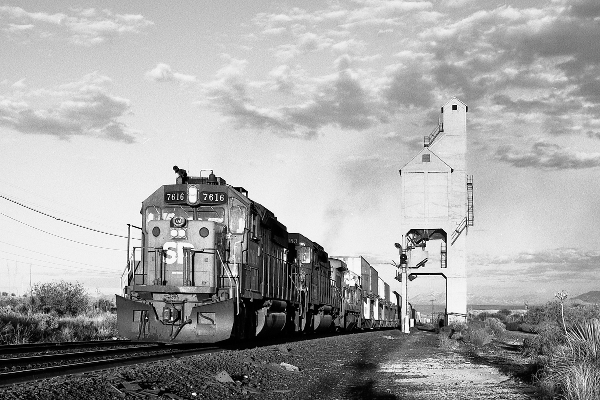 SP 7616 is a class EMD GP40-2 and  is pictured in Mescal, Arizona, USA.  This was taken along the Lordsburg/SP on the Southern Pacific Transportation Company. Photo Copyright: Rick Doughty uploaded to Railroad Gallery on 01/04/2024. This photograph of SP 7616 was taken on Friday, October 25, 1985. All Rights Reserved. 