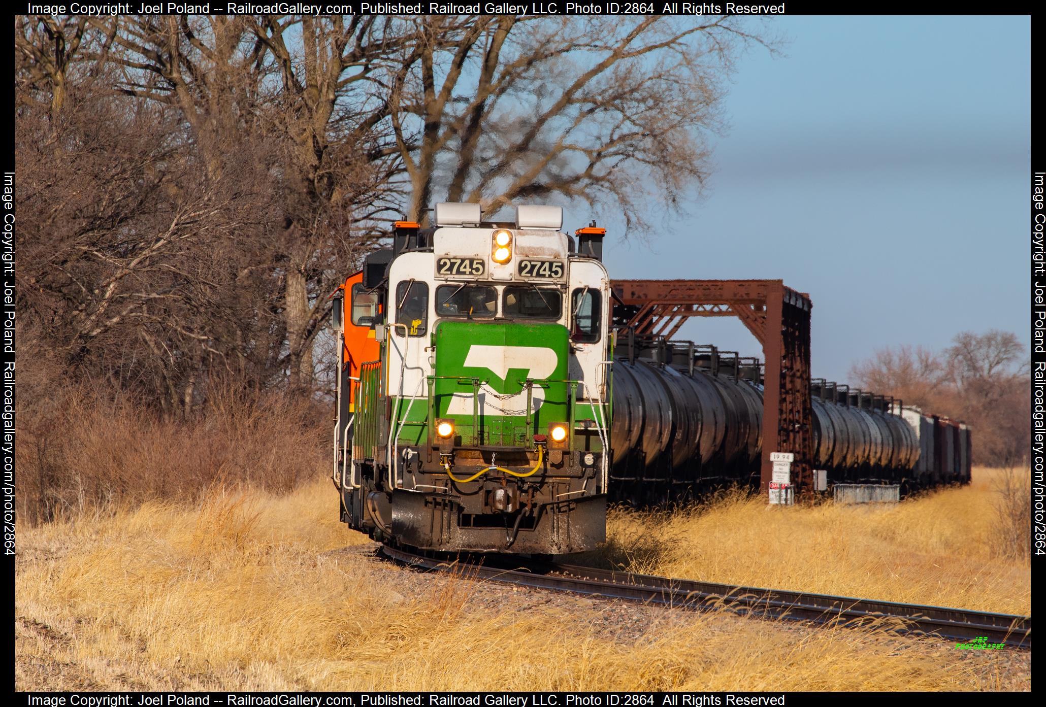 BNSF 2745 is a class EMD GP39E and  is pictured in De Witt, Nebraska, USA.  This was taken along the Beatrice Sub  on the BNSF Railway. Photo Copyright: Joel Poland uploaded to Railroad Gallery on 01/04/2024. This photograph of BNSF 2745 was taken on Friday, December 30, 2022. All Rights Reserved. 