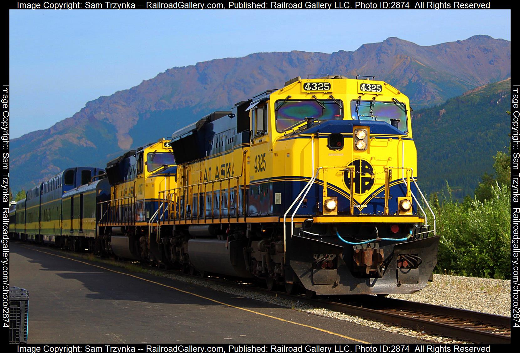 ARR 4325 is a class EMD SD70MAC and  is pictured in Denali Park, Alaska, USA.  This was taken along the ARR Mainline on the Alaska Railroad. Photo Copyright: Sam Trzynka uploaded to Railroad Gallery on 01/05/2024. This photograph of ARR 4325 was taken on Friday, July 28, 2023. All Rights Reserved. 