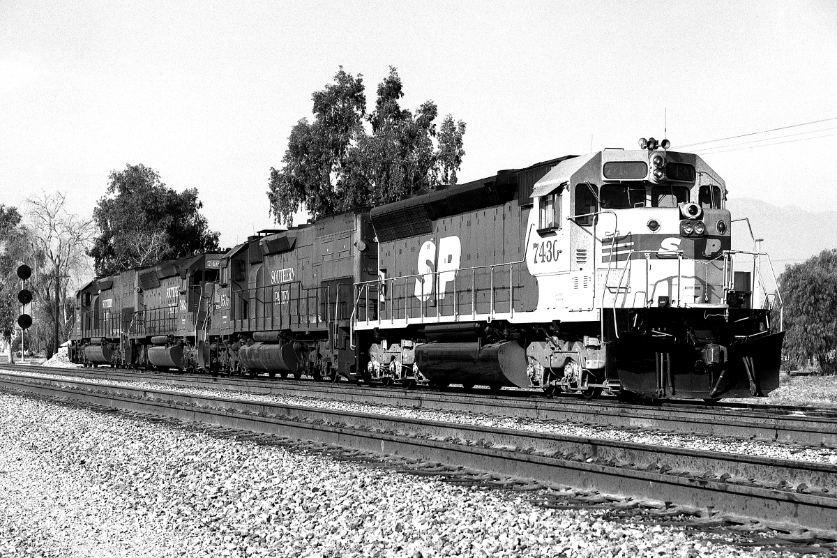 SP 7430 is a class EMD SD45 and  is pictured in Loma Linda, California, USA.  This was taken along the Yuma/SP on the Southern Pacific Transportation Company. Photo Copyright: Rick Doughty uploaded to Railroad Gallery on 01/05/2024. This photograph of SP 7430 was taken on Tuesday, October 15, 1985. All Rights Reserved. 