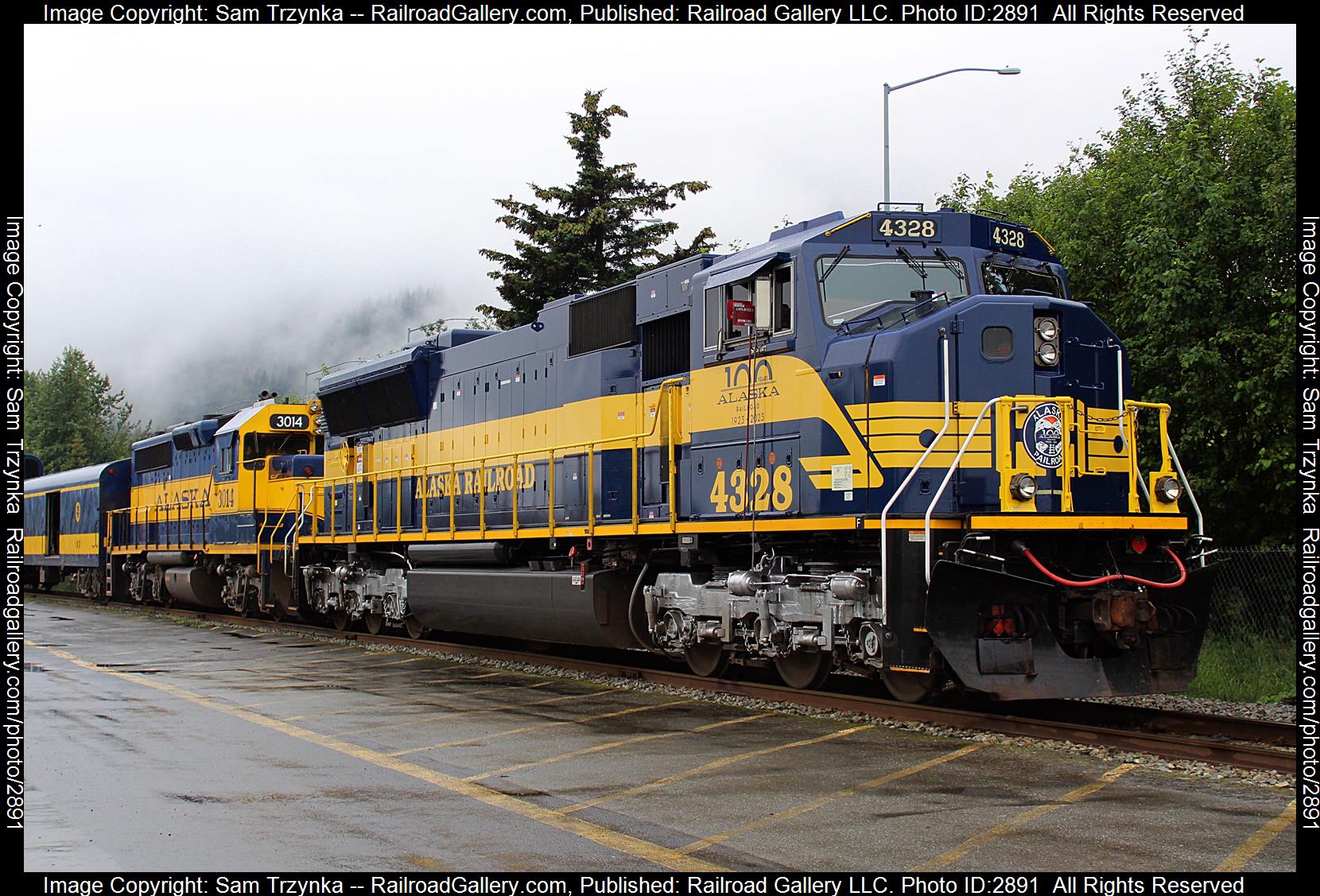 ARR 4328 is a class EMD SD70MAC and  is pictured in Seward, Alaska, USA.  This was taken along the ARR Mainline on the Alaska Railroad. Photo Copyright: Sam Trzynka uploaded to Railroad Gallery on 01/06/2024. This photograph of ARR 4328 was taken on Saturday, July 29, 2023. All Rights Reserved. 