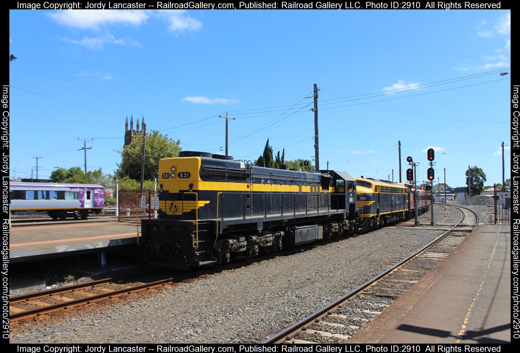 SRHC X31 + B74 is a class G16C + ML2 and  is pictured in Geelong, VIC, Australia.  This was taken along the Warnambool on the Seymour Railway Heritage Centre. Photo Copyright: Jordy Lancaster uploaded to Railroad Gallery on 01/08/2024. This photograph of SRHC X31 + B74 was taken on Saturday, February 23, 2019. All Rights Reserved. 