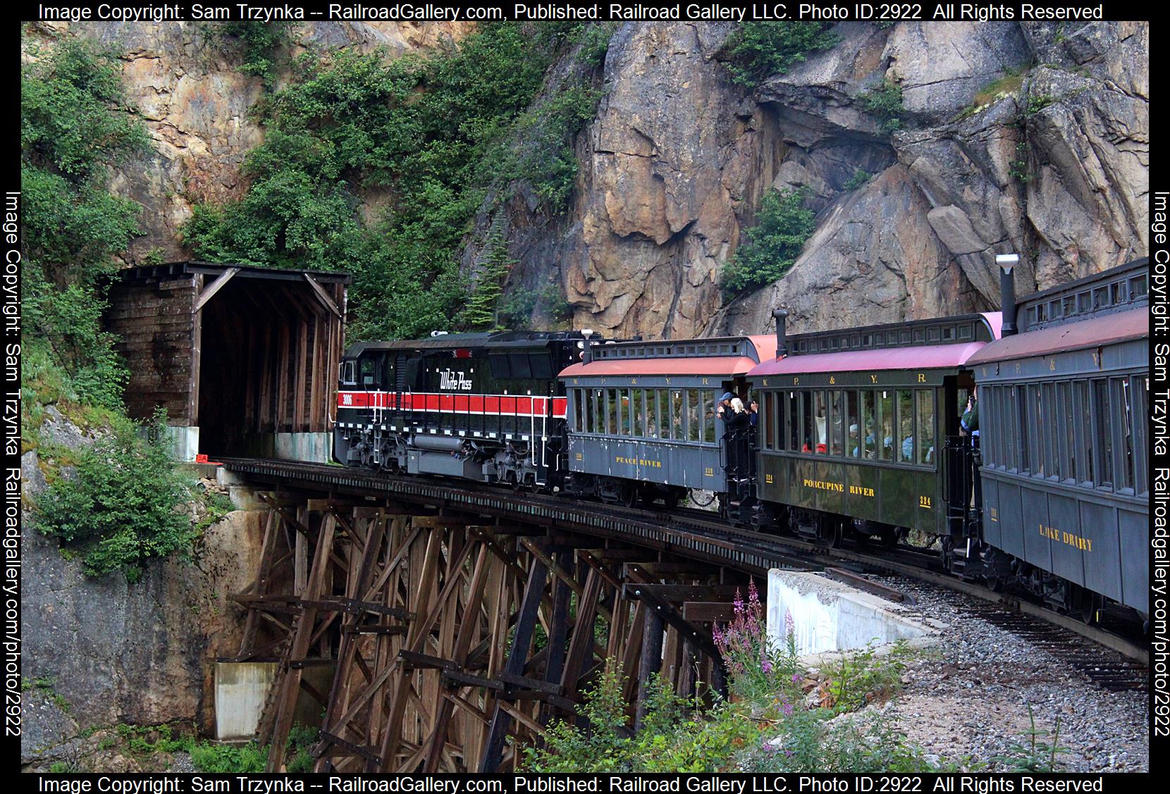 WPYR 3006 is a class NRE E3000CC-DC and  is pictured in Skagway, Alaska, USA.  This was taken along the WPYR Mainline on the White Pass & Yukon Route. Photo Copyright: Sam Trzynka uploaded to Railroad Gallery on 01/09/2024. This photograph of WPYR 3006 was taken on Wednesday, August 02, 2023. All Rights Reserved. 