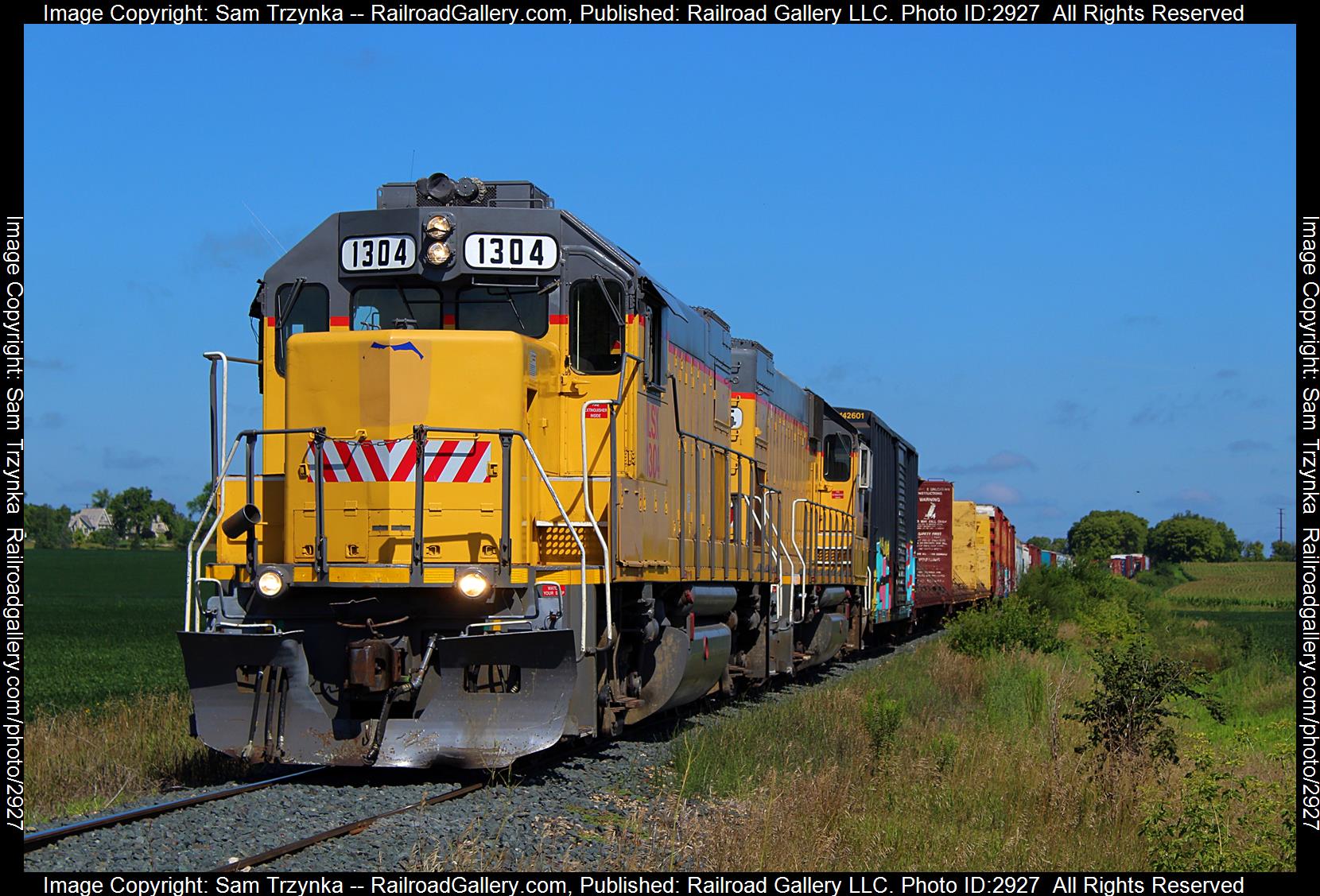 ILSX 1304 is a class EMD GP15-1 and  is pictured in Eureka Center, Minnesota, USA.  This was taken along the PGR Airlake Line on the Progressive Rail. Photo Copyright: Sam Trzynka uploaded to Railroad Gallery on 01/10/2024. This photograph of ILSX 1304 was taken on Friday, August 11, 2023. All Rights Reserved. 