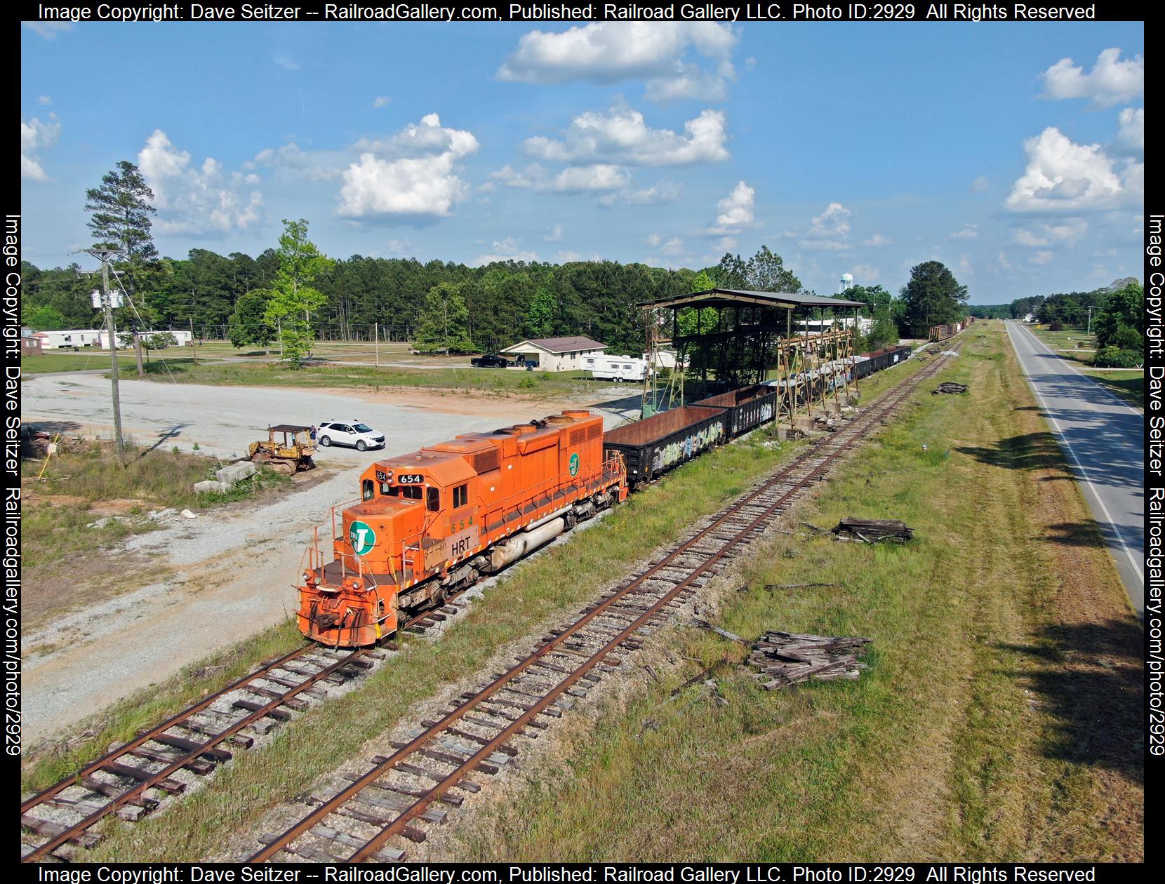 HRT 654 is a class SD38 and  is pictured in Elberton, Georgia, United States.  This was taken along the Main on the Hartwell. Photo Copyright: Dave Seitzer uploaded to Railroad Gallery on 01/11/2024. This photograph of HRT 654 was taken on Monday, May 02, 2022. All Rights Reserved. 