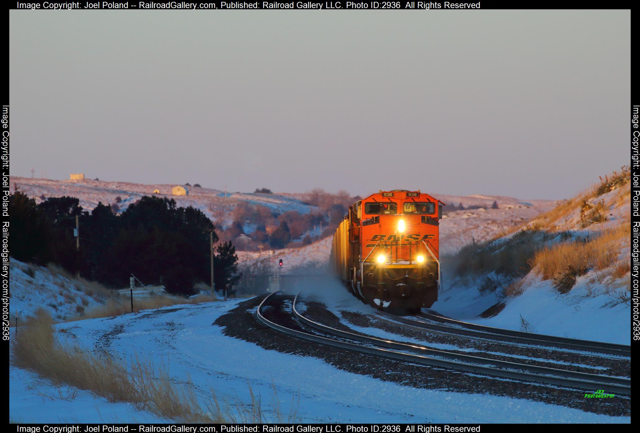 BNSF 9318 is a class EMD SD70ACe and  is pictured in Hyannis, Nebraska, USA.  This was taken along the Sand Hills Sub on the BNSF Railway. Photo Copyright: Joel Poland uploaded to Railroad Gallery on 01/11/2024. This photograph of BNSF 9318 was taken on Saturday, February 25, 2023. All Rights Reserved. 