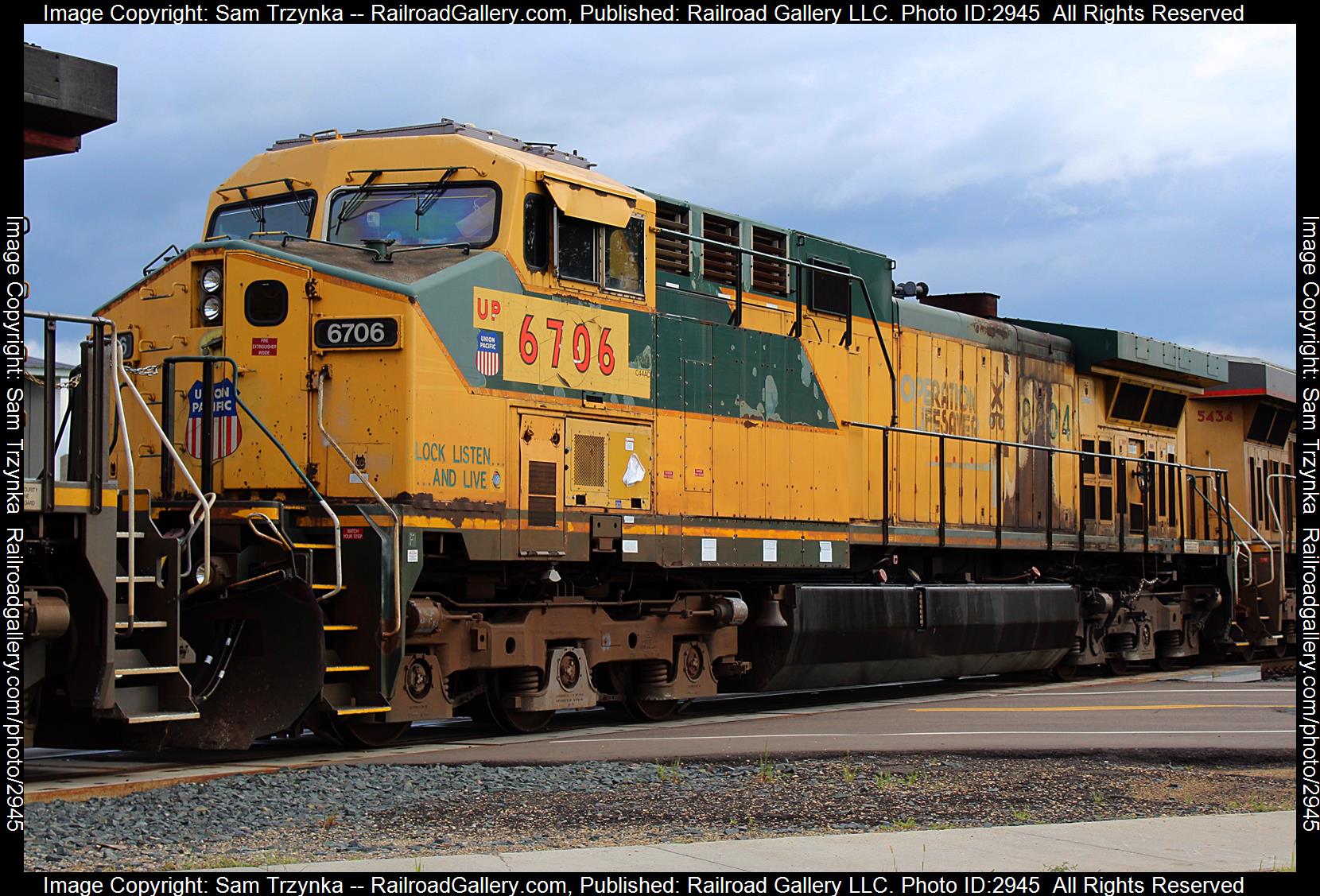 UP 6706 is a class GE AC4400CW and  is pictured in Rosemount, Minnesota, USA.  This was taken along the UP Albert Lea Subdivision on the Union Pacific Railroad. Photo Copyright: Sam Trzynka uploaded to Railroad Gallery on 01/12/2024. This photograph of UP 6706 was taken on Monday, August 14, 2023. All Rights Reserved. 