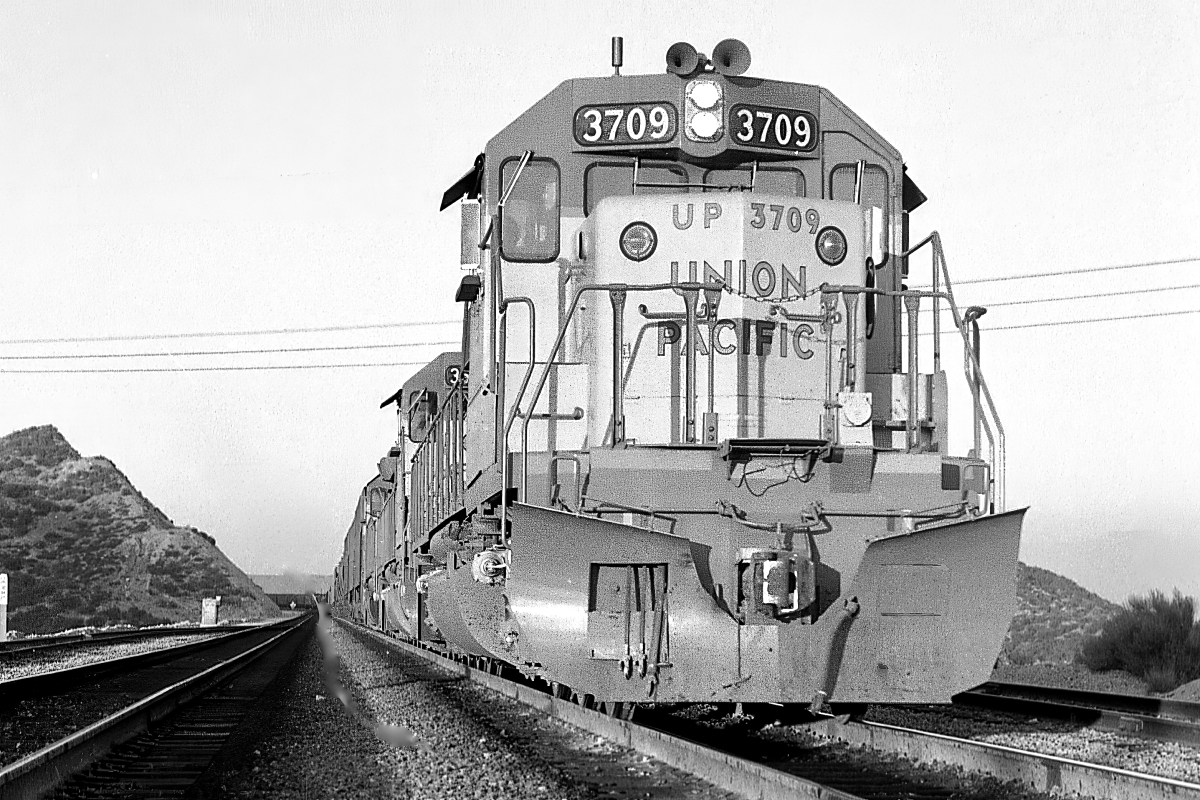 UP 3709 is a class EMD SD40-2 and  is pictured in Summit, California, USA.  This was taken along the Cajon/UP on the Union Pacific Railroad. Photo Copyright: Rick Doughty uploaded to Railroad Gallery on 01/19/2024. This photograph of UP 3709 was taken on Sunday, March 30, 1980. All Rights Reserved. 