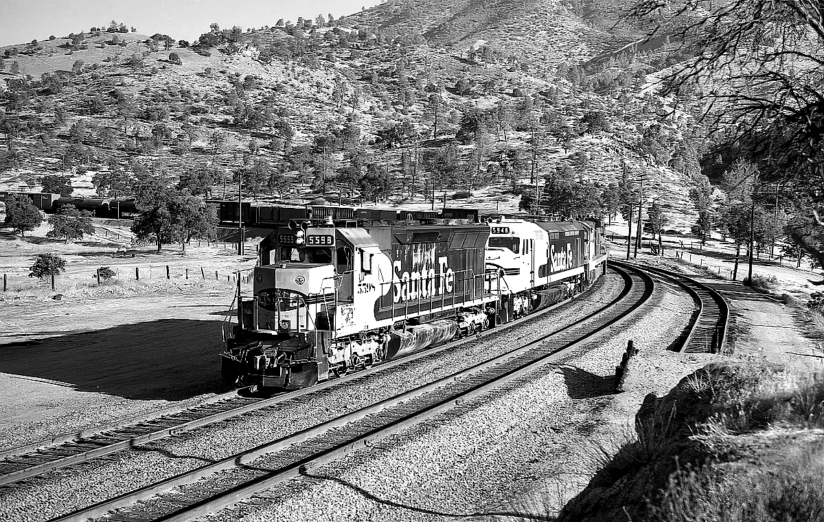 SF 5598 is a class EMD SD45 and  is pictured in Walong, California, USA.  This was taken along the Tehachapi/SF on the Santa Fe. Photo Copyright: Rick Doughty uploaded to Railroad Gallery on 01/20/2024. This photograph of SF 5598 was taken on Saturday, August 25, 1979. All Rights Reserved. 