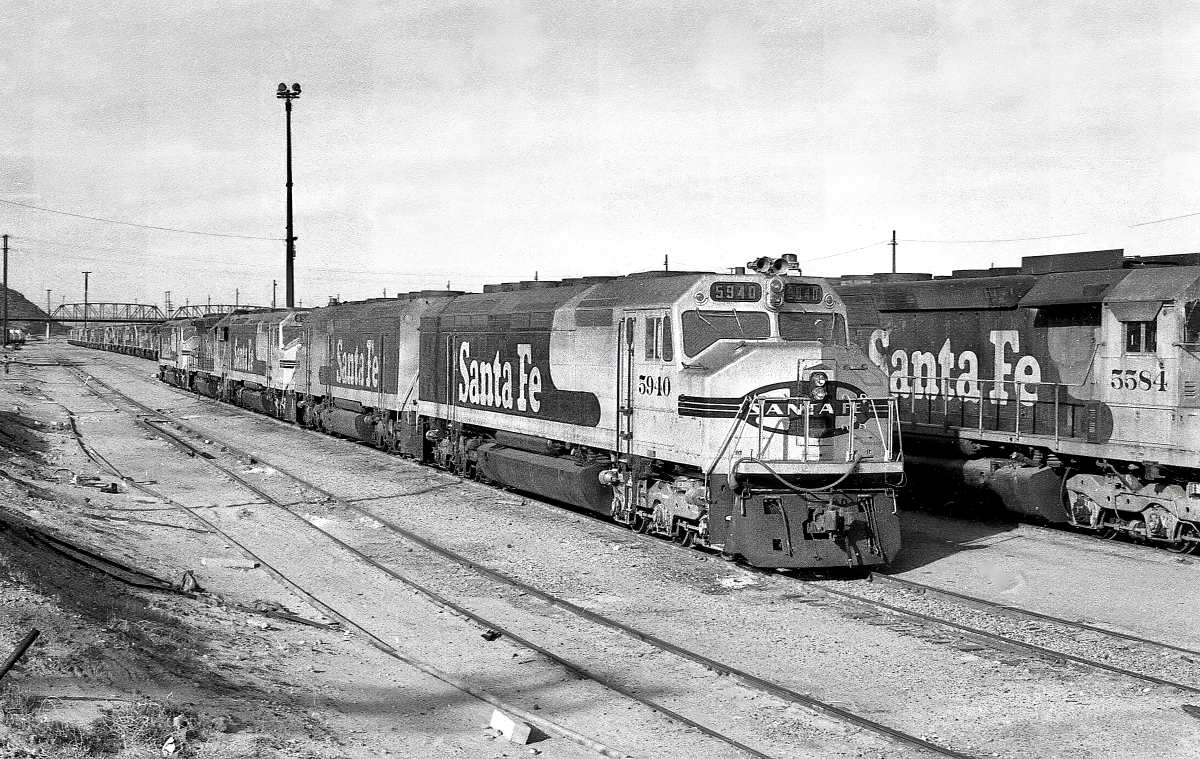 SF 5940 is a class EMD FP45 and  is pictured in Barstow, California, USA.  This was taken along the Barstow/SF on the Santa Fe. Photo Copyright: Rick Doughty uploaded to Railroad Gallery on 01/23/2024. This photograph of SF 5940 was taken on Sunday, December 06, 1981. All Rights Reserved. 