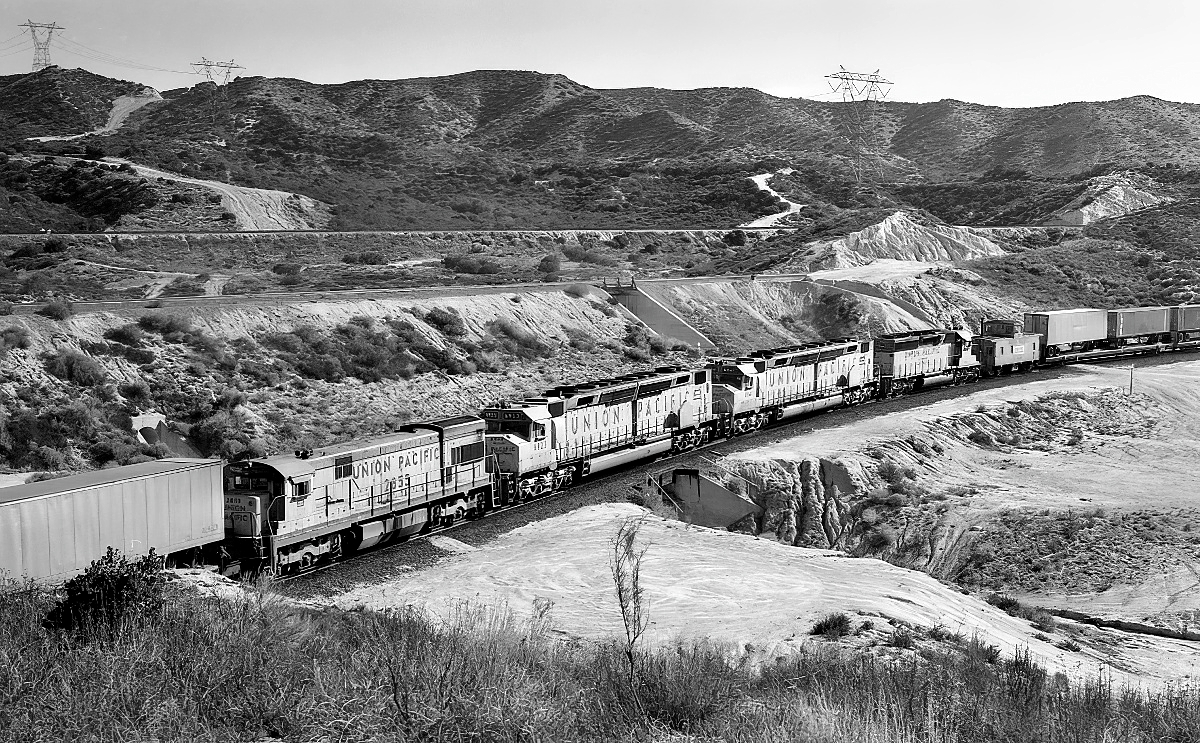 UP 3707 is a class EMD SD40-2 and  is pictured in Summit, California, USA.  This was taken along the Cajon/SF on the Union Pacific Railroad. Photo Copyright: Rick Doughty uploaded to Railroad Gallery on 01/23/2024. This photograph of UP 3707 was taken on Friday, February 24, 1984. All Rights Reserved. 