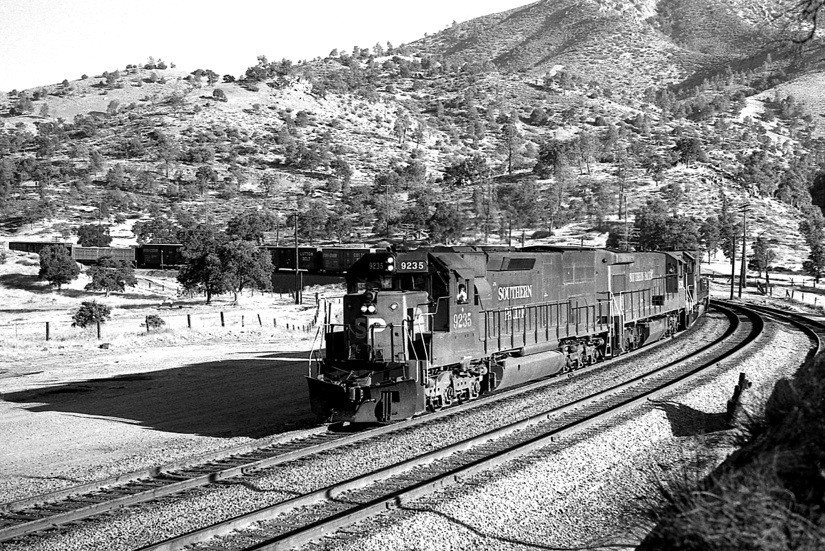 SP 9235 is a class EMD SD45T-2 and  is pictured in Walong, California, USA.  This was taken along the Mojave/SP on the Southern Pacific Transportation Company. Photo Copyright: Rick Doughty uploaded to Railroad Gallery on 01/26/2024. This photograph of SP 9235 was taken on Sunday, August 26, 1979. All Rights Reserved. 