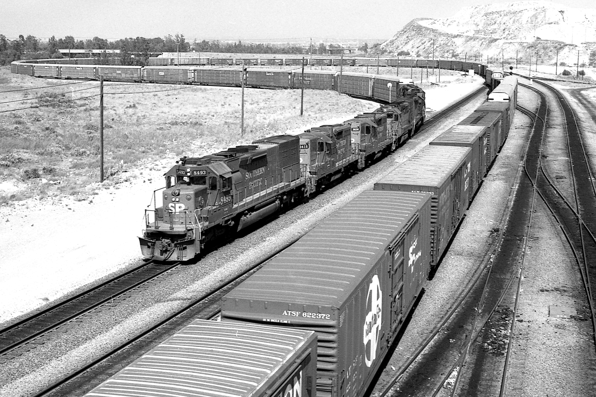 SP 8493 is a class EMD SD40T-2 and  is pictured in West Colton, California, USA.  This was taken along the Los Angeles/SP on the Southern Pacific Transportation Company. Photo Copyright: Rick Doughty uploaded to Railroad Gallery on 01/26/2024. This photograph of SP 8493 was taken on Saturday, June 22, 1985. All Rights Reserved. 