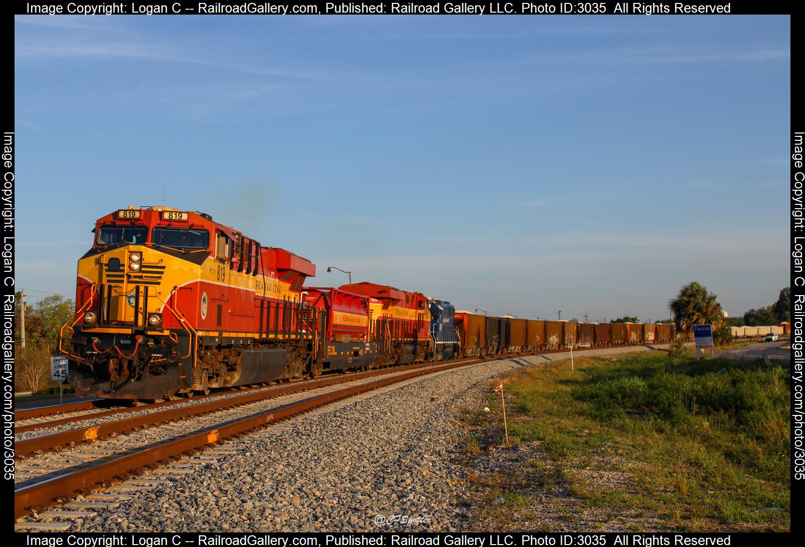 FEC 819 FEC 809 FEC 501 is a class ES44C4 GP38-2 and  is pictured in Cocoa, Florida, USA.  This was taken along the FEC/Brightline Main on the Florida East Coast Railway. Photo Copyright: Logan C uploaded to Railroad Gallery on 01/27/2024. This photograph of FEC 819 FEC 809 FEC 501 was taken on Tuesday, May 02, 2023. All Rights Reserved. 