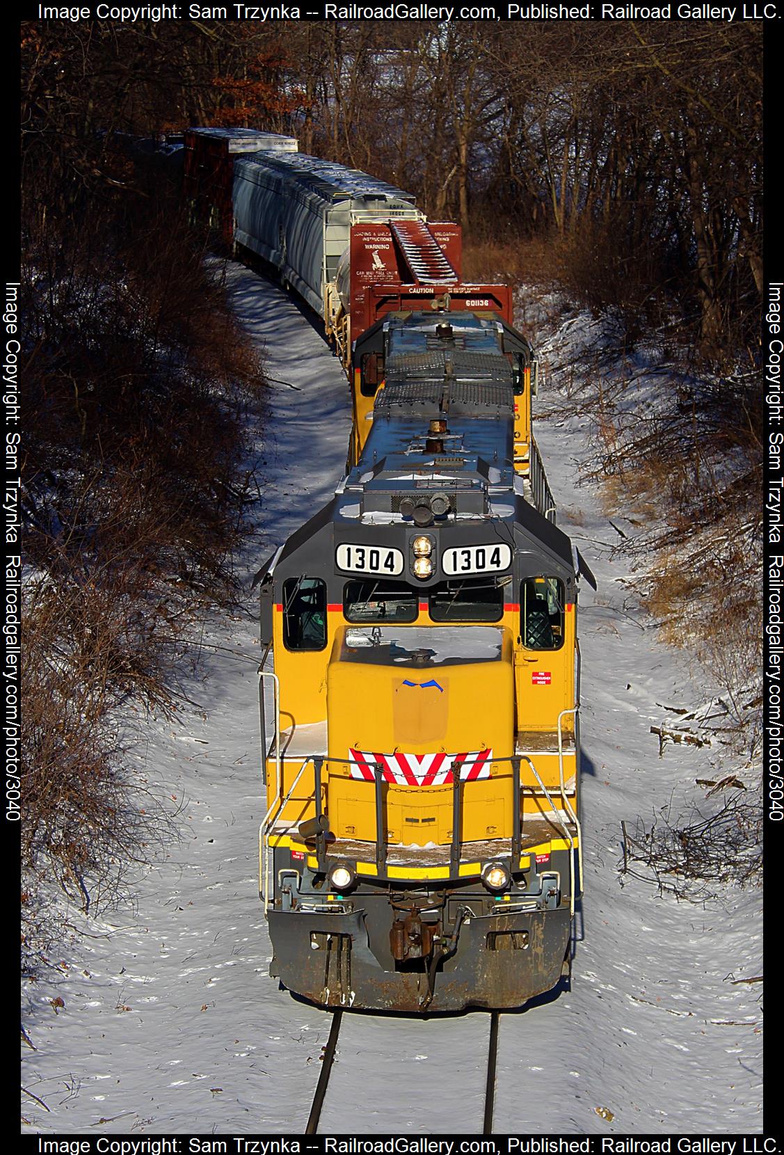 ILSX 1304 is a class EMD GP15-1 and  is pictured in Eureka Center, Minnesota, USA.  This was taken along the PGR Airlake Line on the Progressive Rail. Photo Copyright: Sam Trzynka uploaded to Railroad Gallery on 01/28/2024. This photograph of ILSX 1304 was taken on Monday, January 15, 2024. All Rights Reserved. 