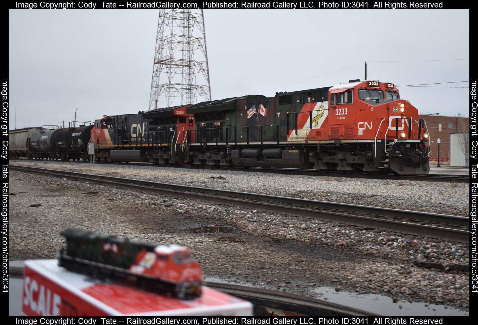 CN 3233 is a class ET44AC and  is pictured in Centralia, Illinois, United States.  This was taken along the Centralia subdivision  on the Canadian National Railway. Photo Copyright: Cody  Tate uploaded to Railroad Gallery on 01/28/2024. This photograph of CN 3233 was taken on Sunday, January 28, 2024. All Rights Reserved. 