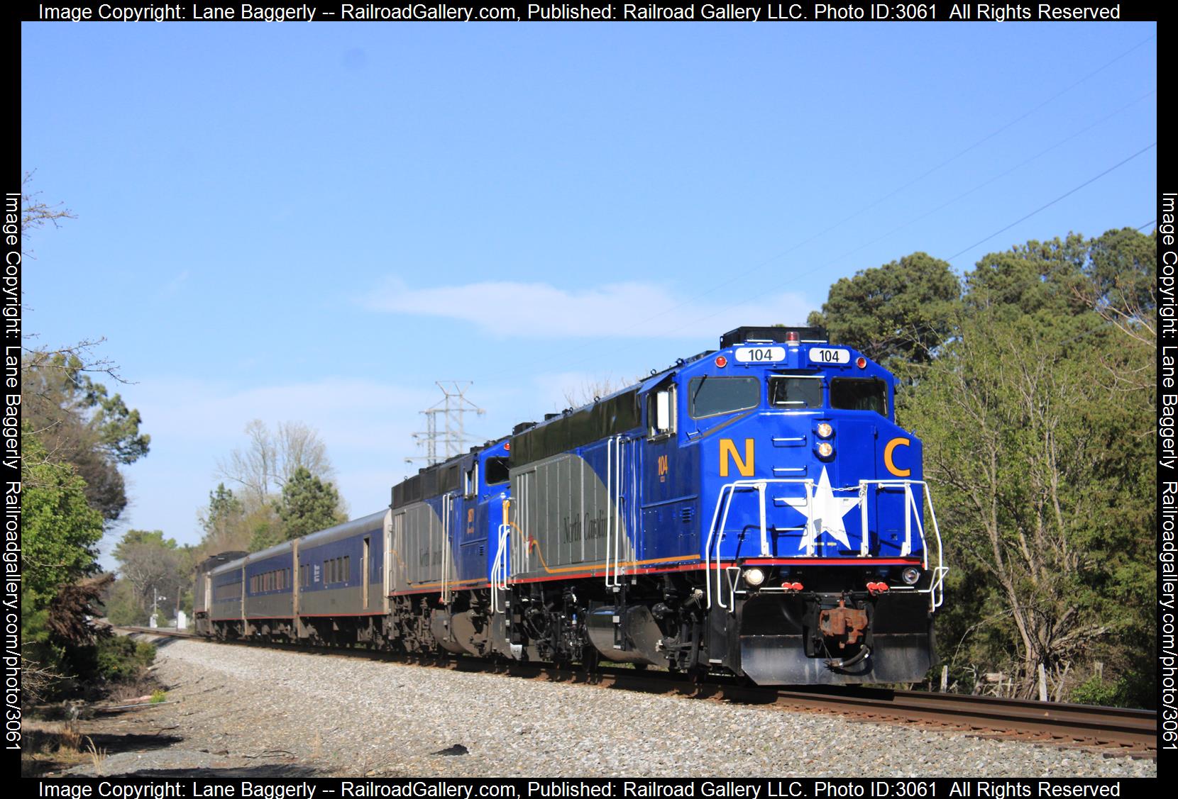 NCDOT 104 is a class CCU and  is pictured in Elon, North Carolina, United States.  This was taken along the H-Line  on the North Carolina Department of Transportation . Photo Copyright: Lane Baggerly uploaded to Railroad Gallery on 02/01/2024. This photograph of NCDOT 104 was taken on Wednesday, April 06, 2022. All Rights Reserved. 