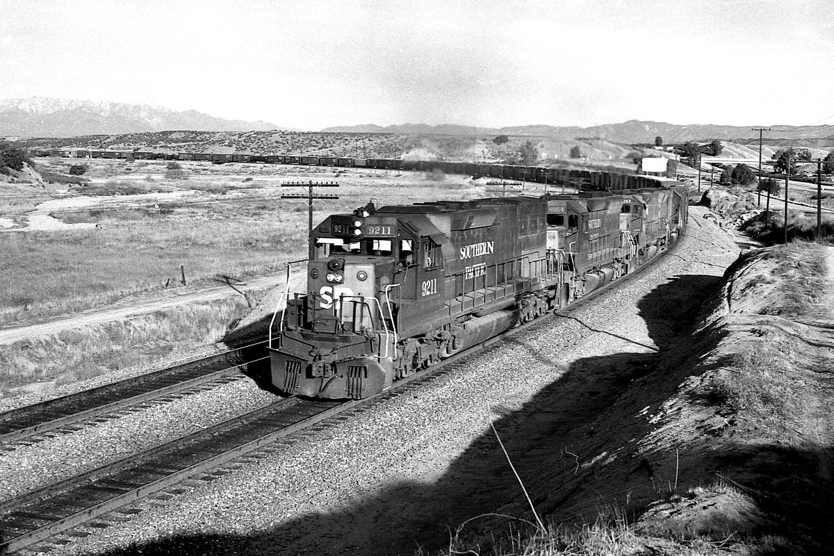 SP 9211 is a class EMD SD45T-2 and  is pictured in Beaumont, California, USA.  This was taken along the Yuma/SP on the Southern Pacific Transportation Company. Photo Copyright: Rick Doughty uploaded to Railroad Gallery on 02/02/2024. This photograph of SP 9211 was taken on Sunday, February 15, 1981. All Rights Reserved. 