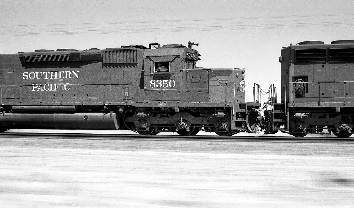 SP 8350 is a class EMD SD40T-2 and  is pictured in Edison, California, USA.  This was taken along the Mojave/SP on the Southern Pacific Transportation Company. Photo Copyright: Rick Doughty uploaded to Railroad Gallery on 02/03/2024. This photograph of SP 8350 was taken on Monday, August 27, 1979. All Rights Reserved. 