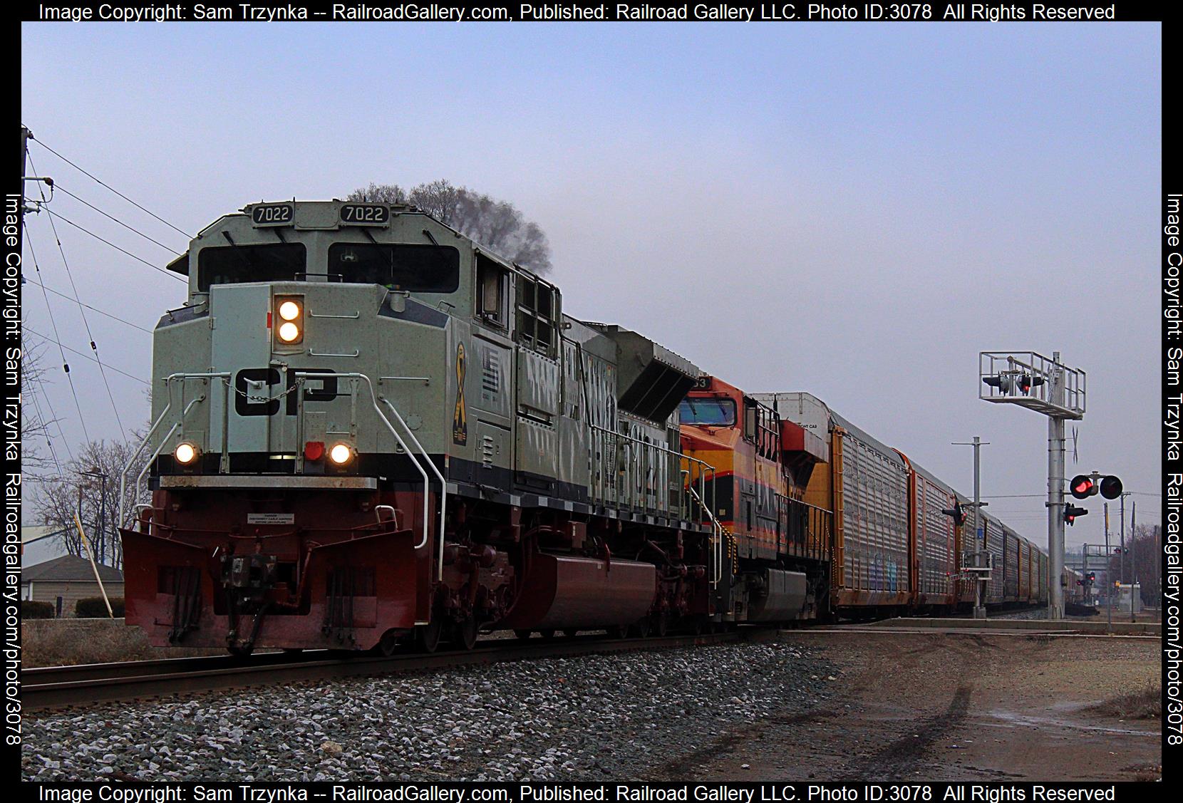 CP 7022 is a class EMD SD70ACU and  is pictured in Crystal, Minnesota, USA.  This was taken along the CP Paynesville Subdivision on the CPKC Railway. Photo Copyright: Sam Trzynka uploaded to Railroad Gallery on 02/04/2024. This photograph of CP 7022 was taken on Saturday, January 27, 2024. All Rights Reserved. 