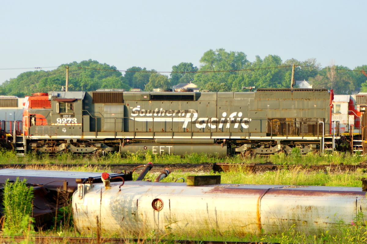 SP 9273 is a class EMD SD45T-2 and  is pictured in Silvis, Illinois, USA.  This was taken along the Southern Pacific Transportation Company. Photo Copyright: Rick Doughty uploaded to Railroad Gallery on 02/05/2024. This photograph of SP 9273 was taken on Friday, June 21, 2019. All Rights Reserved. 