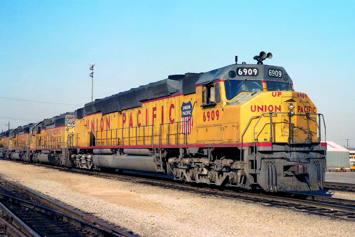 UP 6909 is a class EMD DD40X and  is pictured in Los Angeles, California, USA.  This was taken along the Los Angeles/UP on the Union Pacific Railroad. Photo Copyright: Rick Doughty uploaded to Railroad Gallery on 02/06/2024. This photograph of UP 6909 was taken on Saturday, November 15, 1980. All Rights Reserved. 