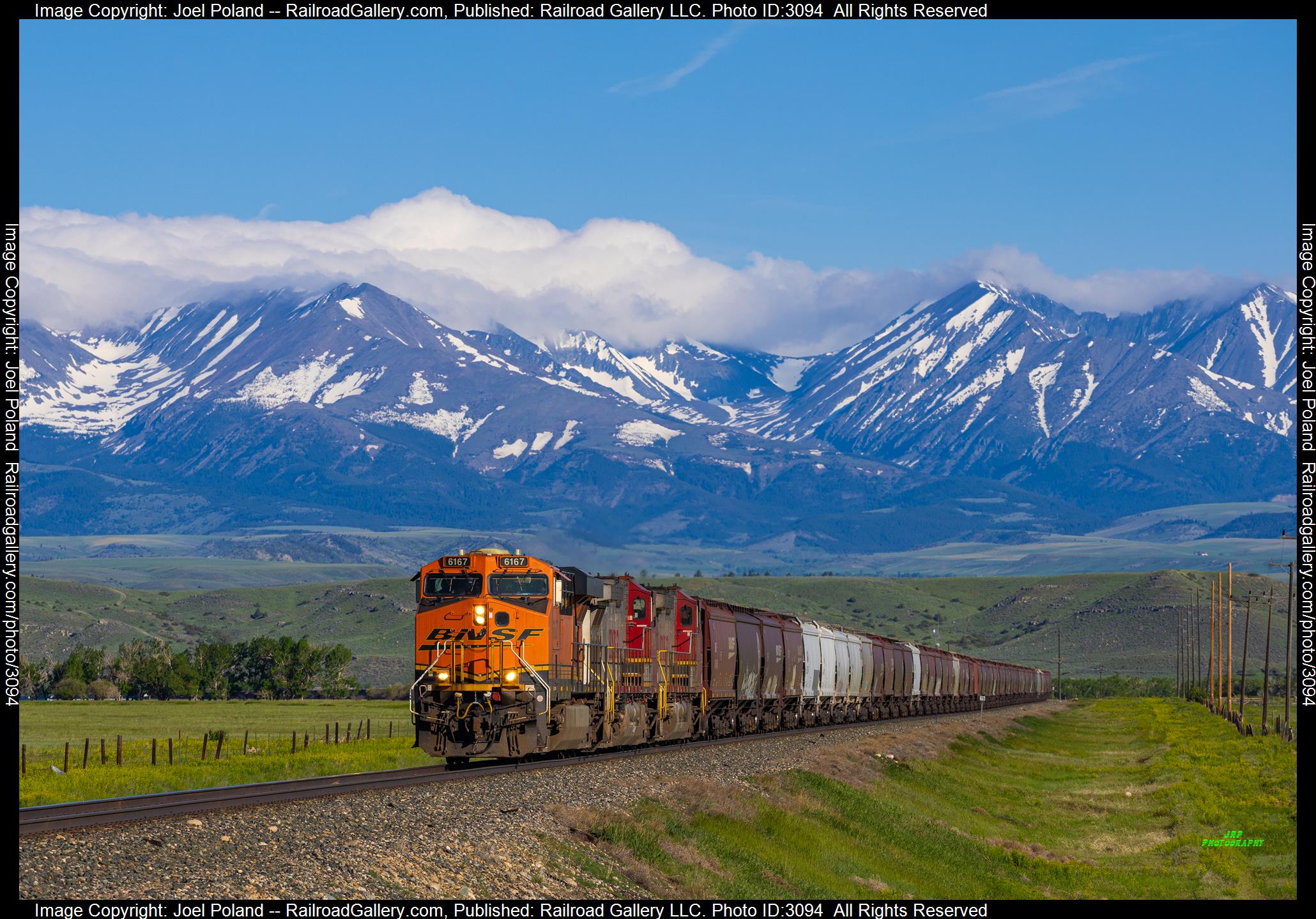 BNSF 6167 is a class GE ES44AC and  is pictured in Big Timber, Montana, USA.  This was taken along the 2nd Sub on the Montana Rail Link. Photo Copyright: Joel Poland uploaded to Railroad Gallery on 02/06/2024. This photograph of BNSF 6167 was taken on Monday, May 29, 2023. All Rights Reserved. 