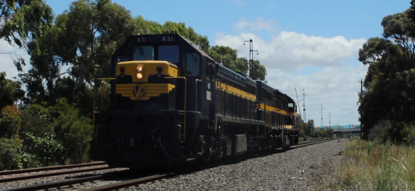 SRHC X31 + C501 is a class G16C + GT26C and  is pictured in Spotswood/South Kingsville, VIC, Australia.  This was taken along the Western Standard Gauge on the ARTC. Photo Copyright: Jordy Lancaster uploaded to Railroad Gallery on 02/06/2024. This photograph of SRHC X31 + C501 was taken on Tuesday, February 06, 2024. All Rights Reserved. 