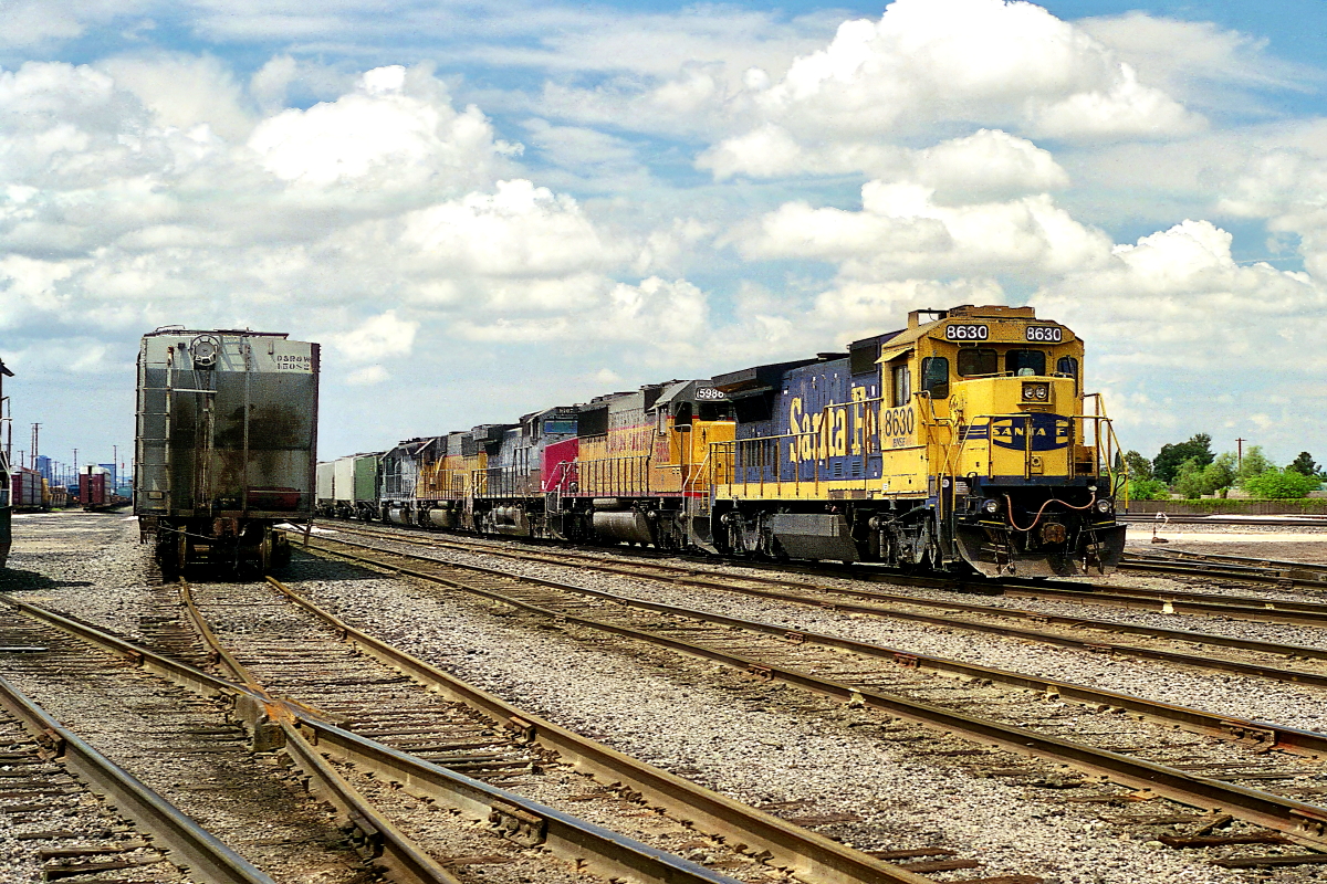 BNSF 8630 is a class GE B40-8 (Dash 8-40B) and  is pictured in Tucson, Arizona, USA.  This was taken along the Lordsburg/UP on the Santa Fe. Photo Copyright: Rick Doughty uploaded to Railroad Gallery on 02/09/2024. This photograph of BNSF 8630 was taken on Monday, August 28, 2000. All Rights Reserved. 