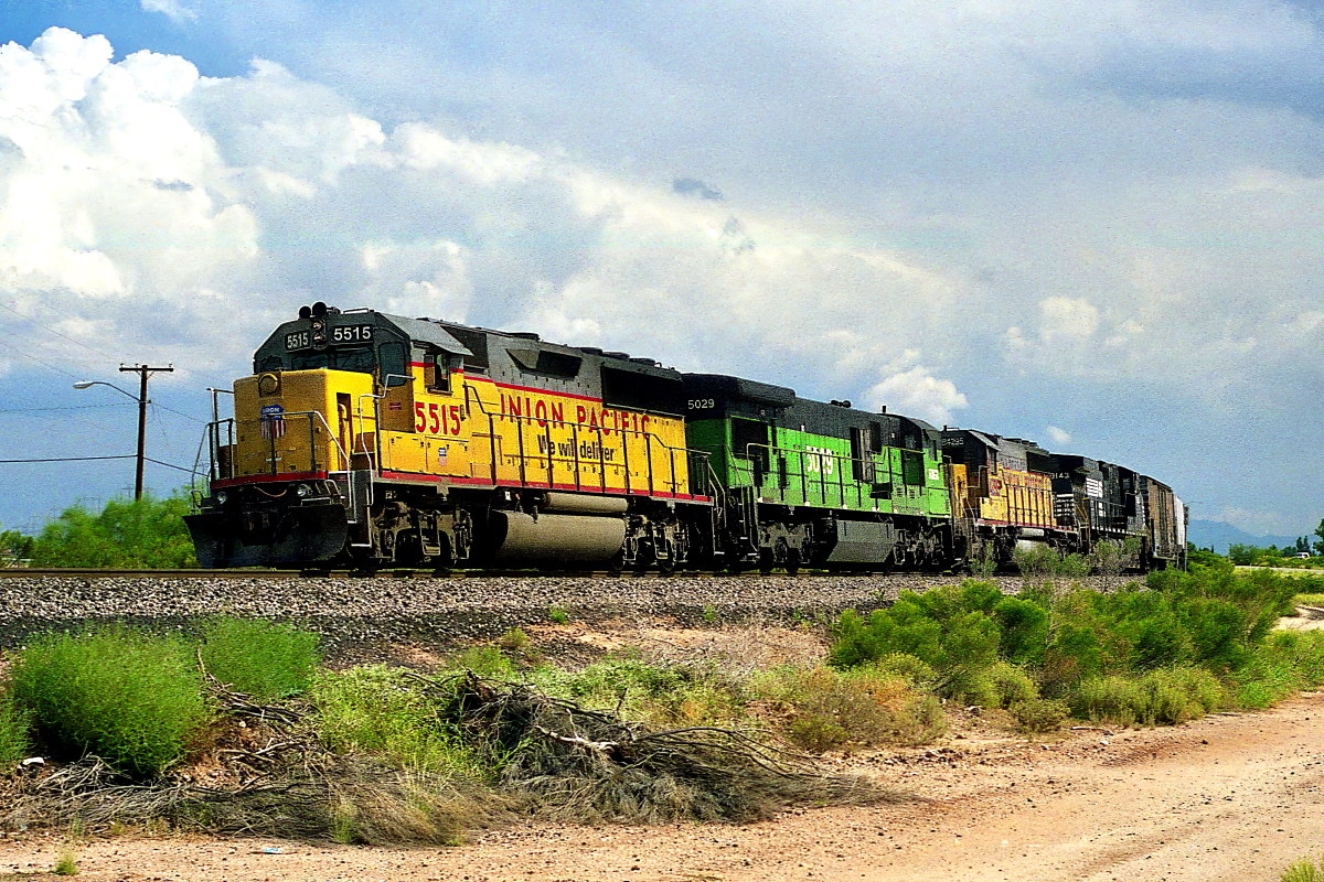 UP 5515 is a class EMD GP50 and  is pictured in Tucson, Arizona, USA.  This was taken along the Lordsburg/UP on the Union Pacific Railroad. Photo Copyright: Rick Doughty uploaded to Railroad Gallery on 02/10/2024. This photograph of UP 5515 was taken on Sunday, September 19, 1999. All Rights Reserved. 