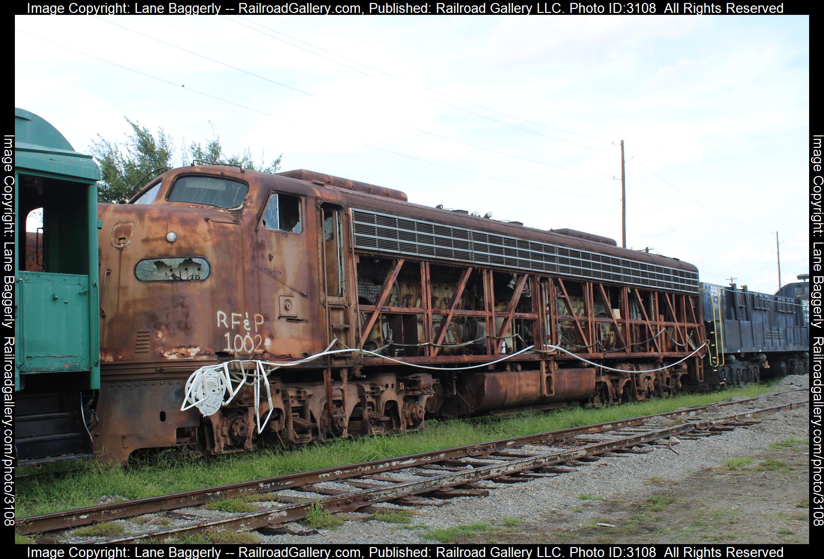 RF&P 1002 is a class EMD E8(A) and  is pictured in Roanoke, Virginia, United States.  This was taken along the VMT on the Richmond, Fredericksburg & Potomac. Photo Copyright: Lane Baggerly uploaded to Railroad Gallery on 02/10/2024. This photograph of RF&P 1002 was taken on Saturday, September 04, 2021. All Rights Reserved. 