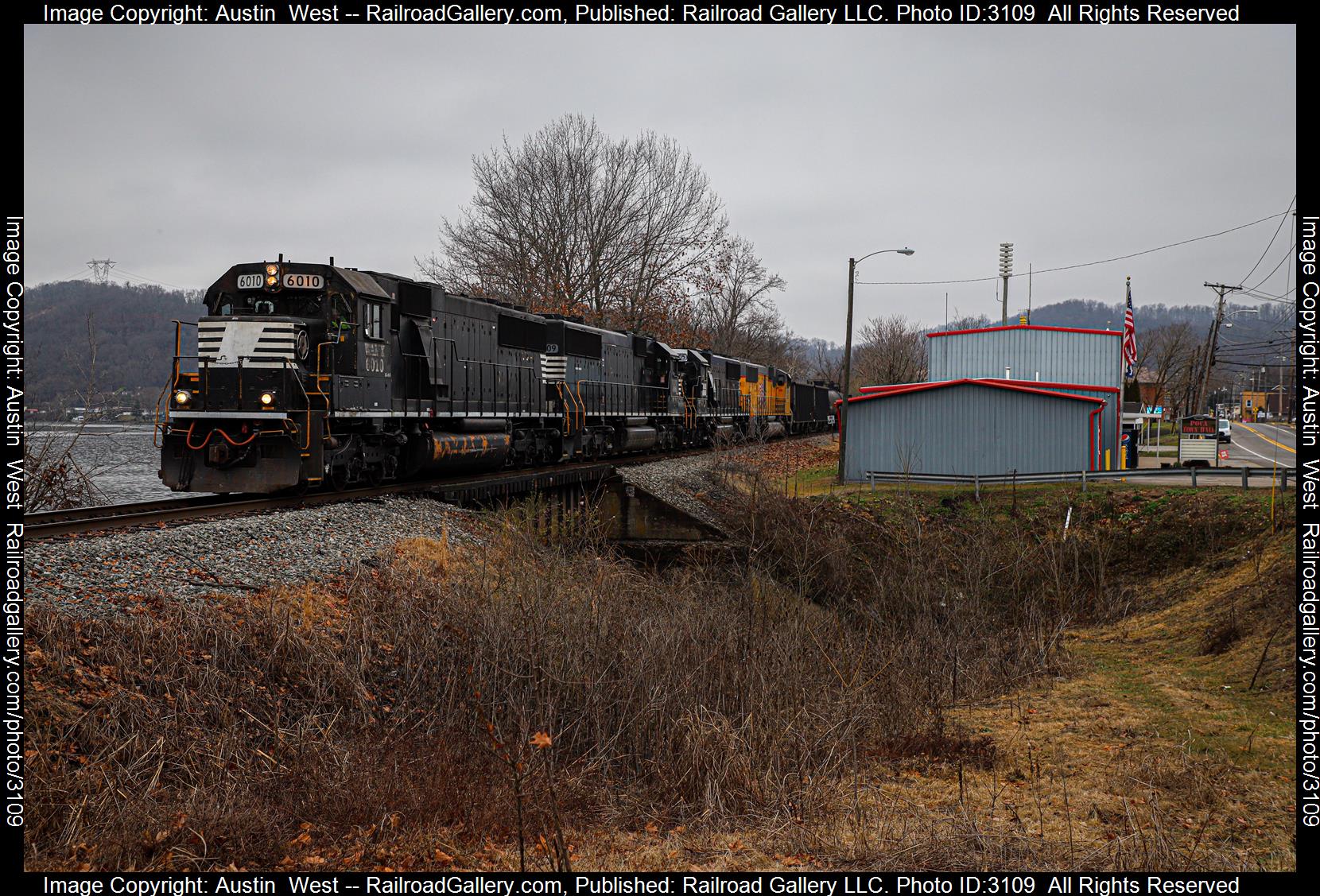 WAMX 6010 is a class EMD SD60 and  is pictured in Poca, West Virginia, United States.  This was taken along the Kanawha District on the Kanawha River Railroad. Photo Copyright: Austin  West uploaded to Railroad Gallery on 02/11/2024. This photograph of WAMX 6010 was taken on Sunday, February 11, 2024. All Rights Reserved. 