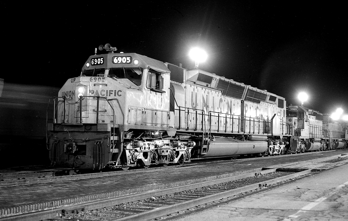 UP 6905 is a class EMD DD40X and  is pictured in San Bernardino, California, USA.  This was taken along the Cajon/UP on the Union Pacific Railroad. Photo Copyright: Rick Doughty uploaded to Railroad Gallery on 02/16/2024. This photograph of UP 6905 was taken on Saturday, February 04, 1984. All Rights Reserved. 