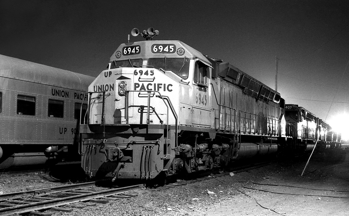 UP 6945 is a class EMD DD40X and  is pictured in Las Vegas, Nevada, USA.  This was taken along the Las Vegas/UP on the Union Pacific Railroad. Photo Copyright: Rick Doughty uploaded to Railroad Gallery on 02/21/2024. This photograph of UP 6945 was taken on Saturday, January 10, 1981. All Rights Reserved. 