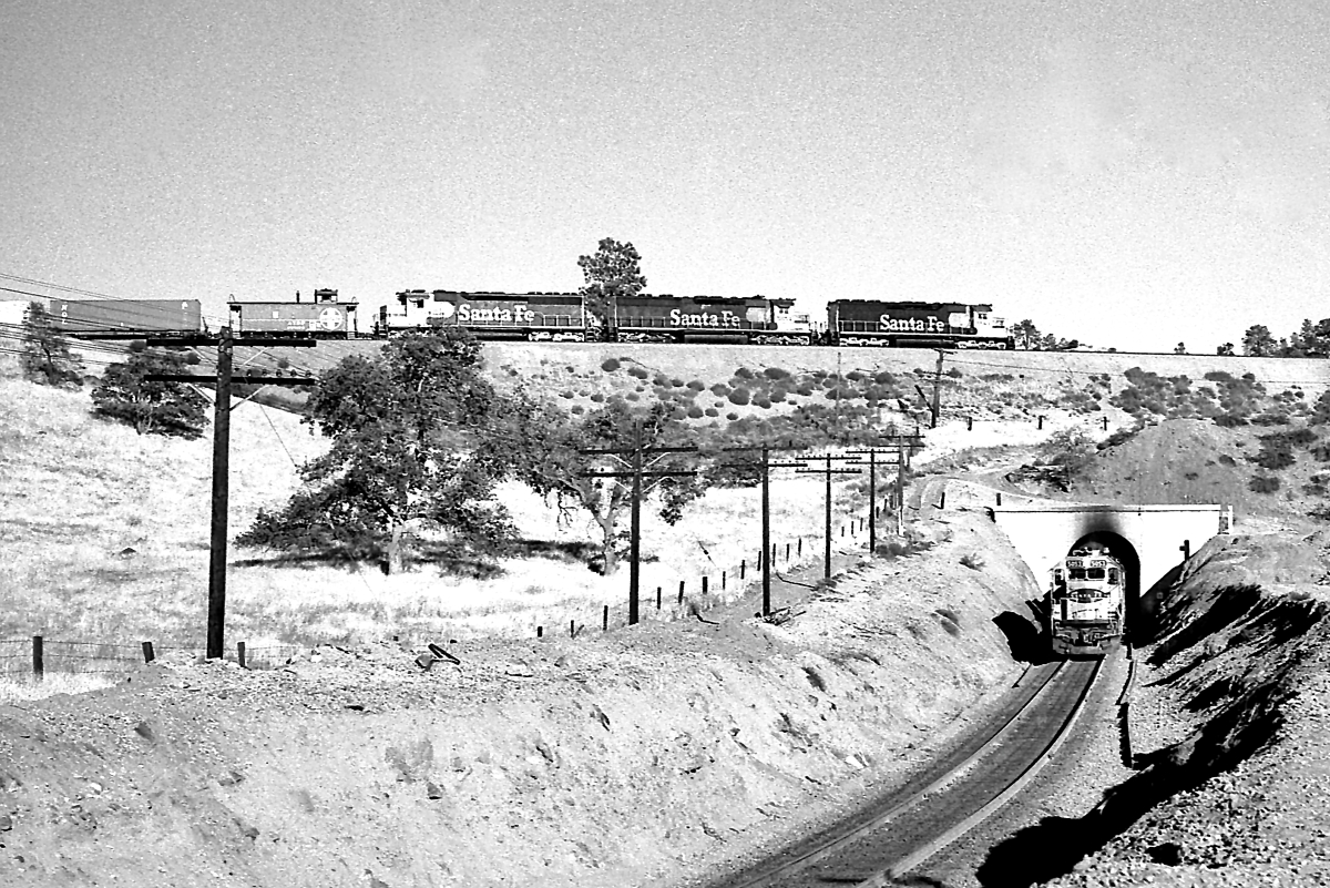 SF 5053 is a class EMD SD40-2 and  is pictured in Walong, California, USA.  This was taken along the Mojave/SP on the Santa Fe. Photo Copyright: Rick Doughty uploaded to Railroad Gallery on 02/21/2024. This photograph of SF 5053 was taken on Sunday, August 26, 1979. All Rights Reserved. 