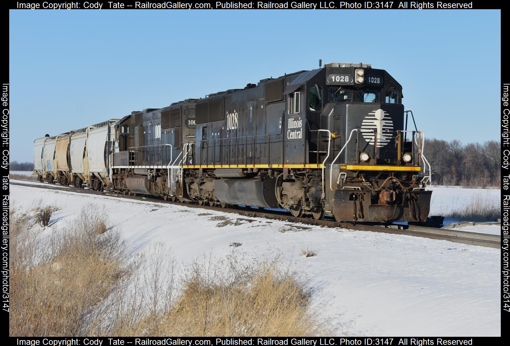 IC 1028 is a class SD70 and  is pictured in Du Bois , Illinois, United States.  This was taken along the Centralia subdivision  on the Canadian National Railway. Photo Copyright: Cody  Tate uploaded to Railroad Gallery on 02/23/2024. This photograph of IC 1028 was taken on Saturday, February 17, 2024. All Rights Reserved. 